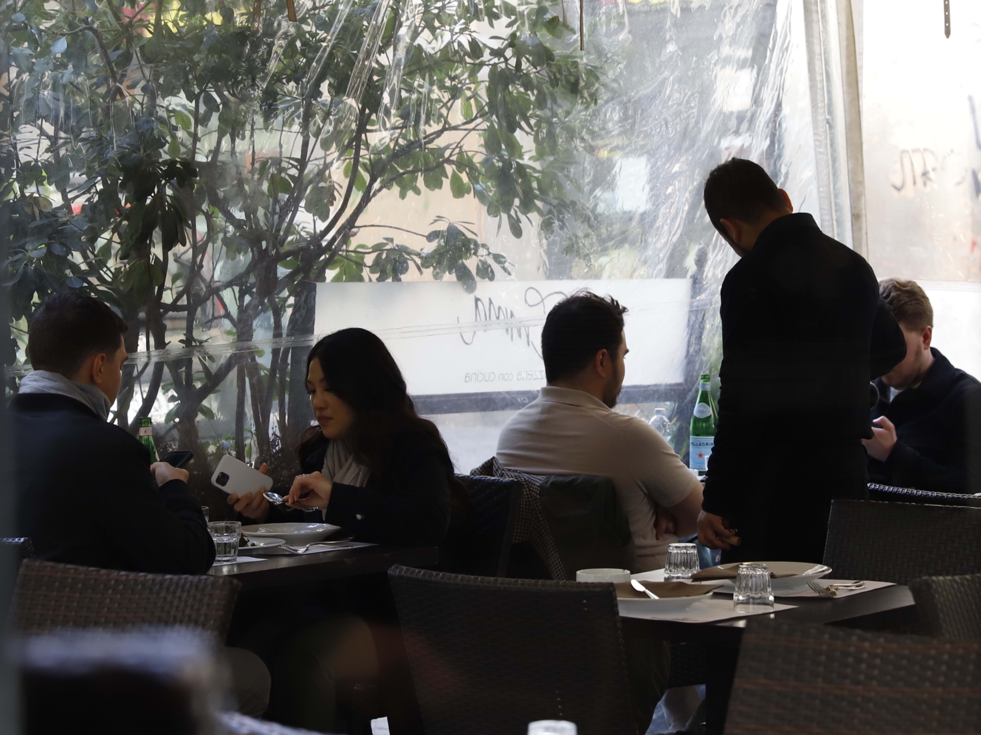 Interior dining space during lunch service at Emma