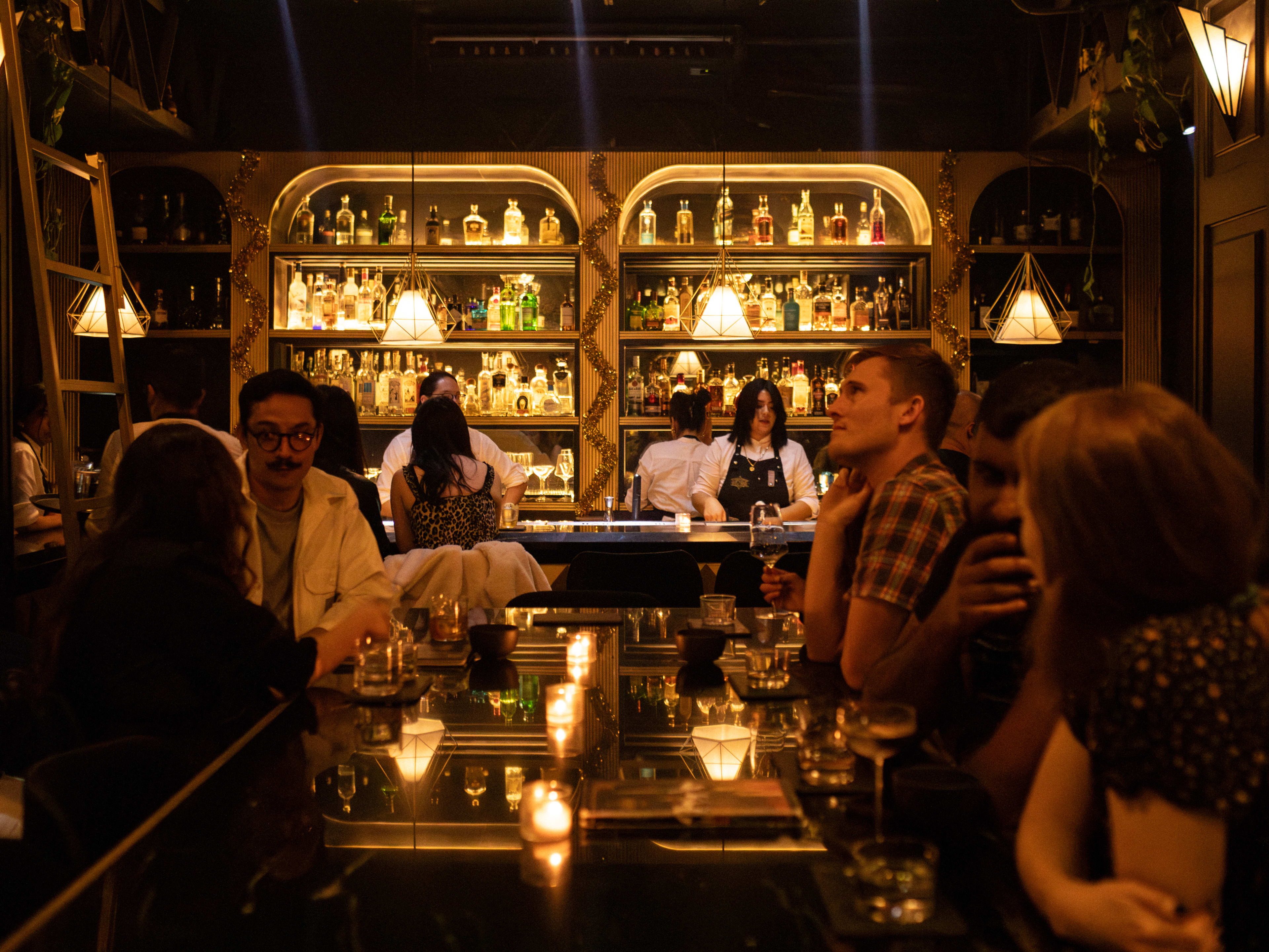 Interior bar space in dim lighting at Handshake Bar