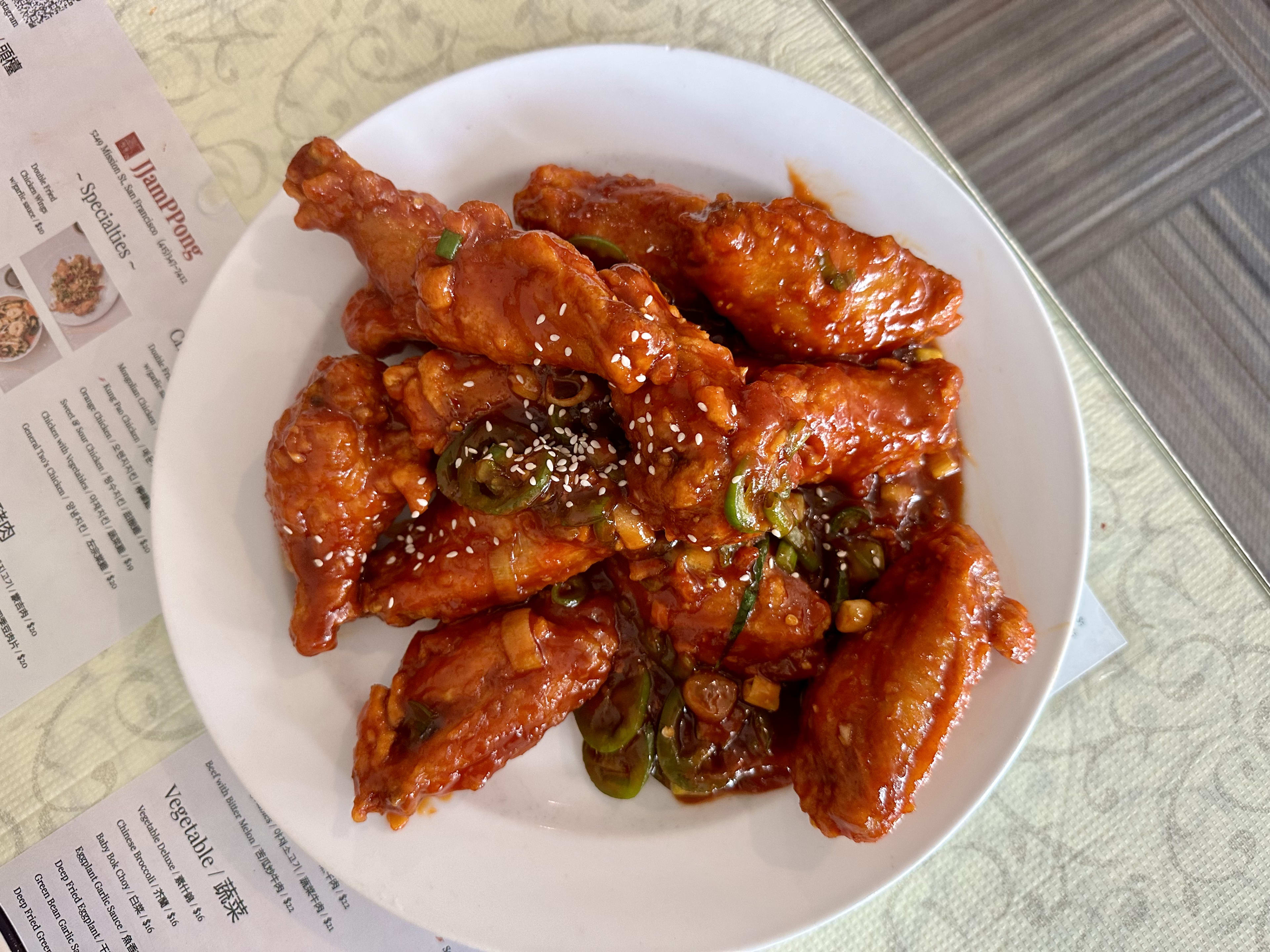 chicken wings piled high on plate