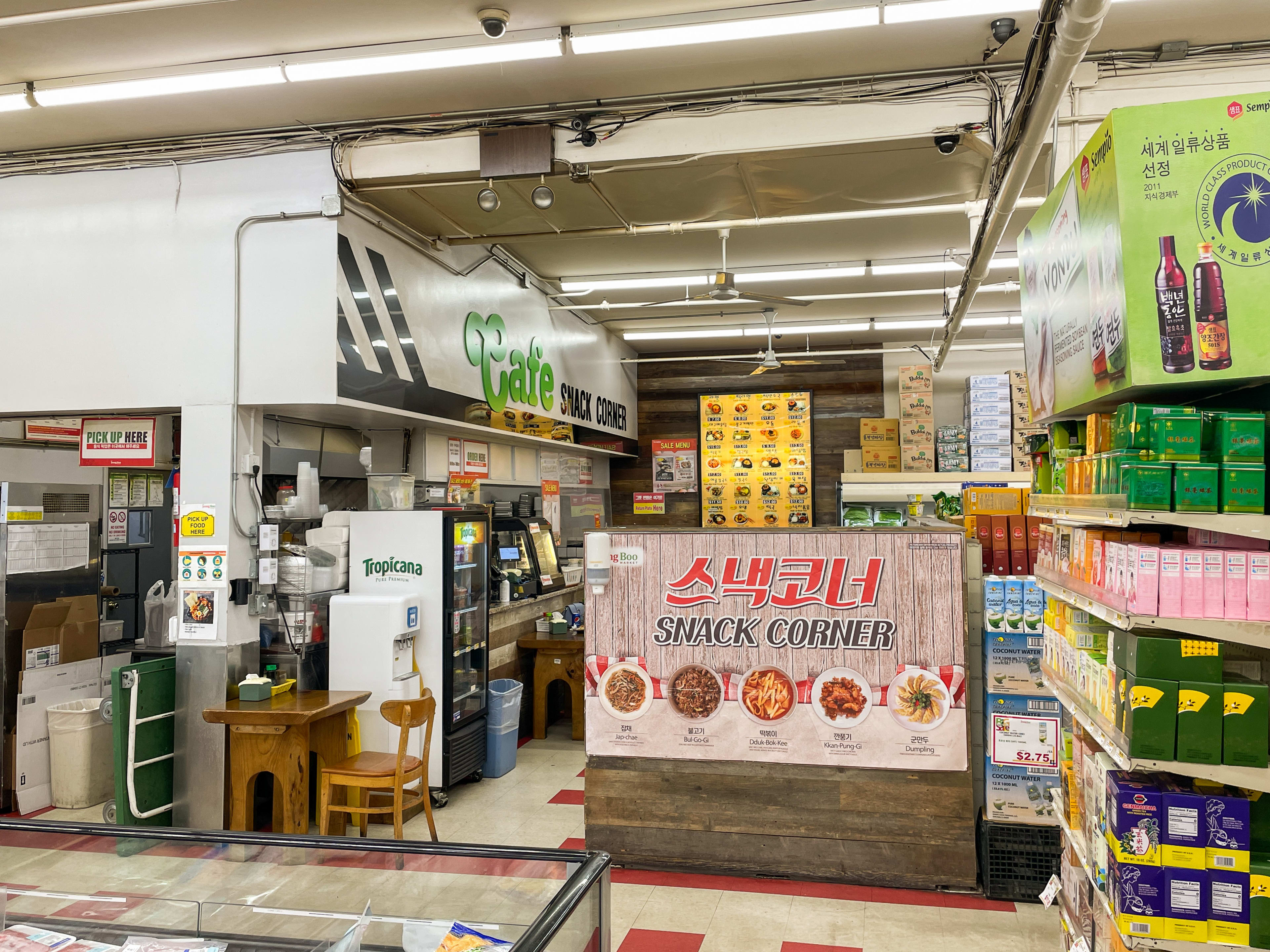 A Korean cafe in the the back of a grocery store.