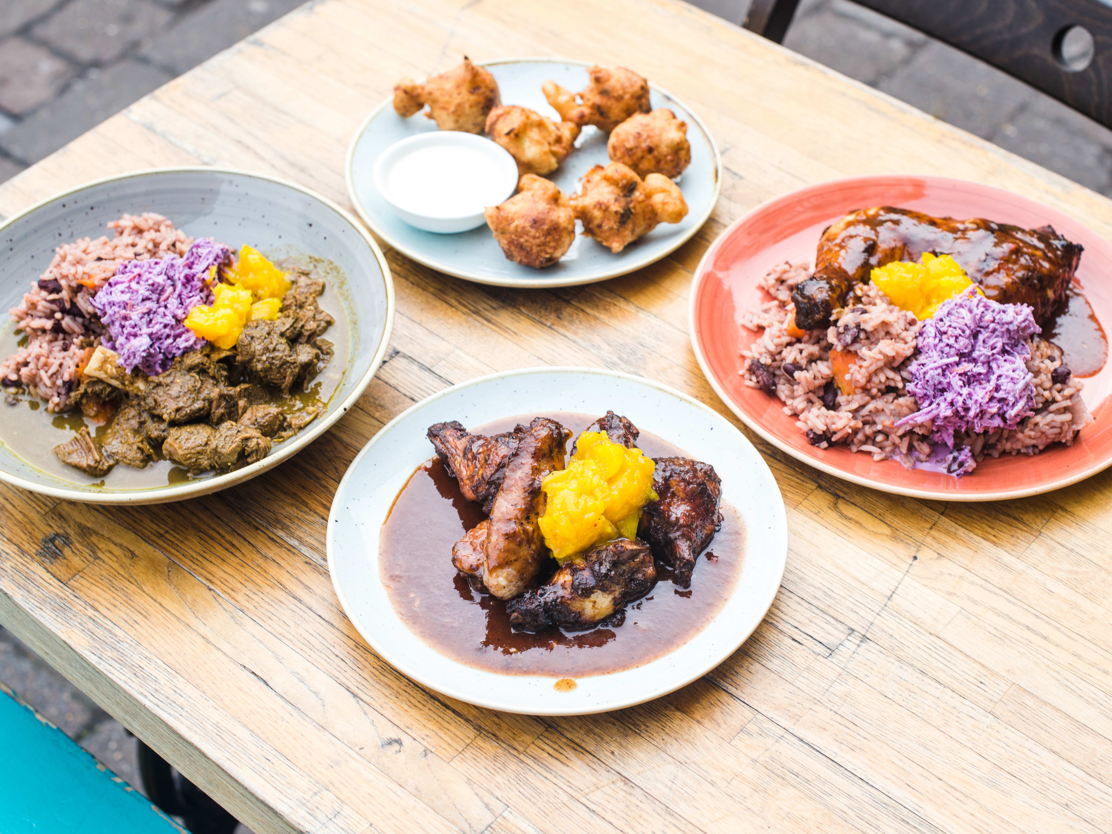 A spread of dishes from Fish, Wings & Tings.