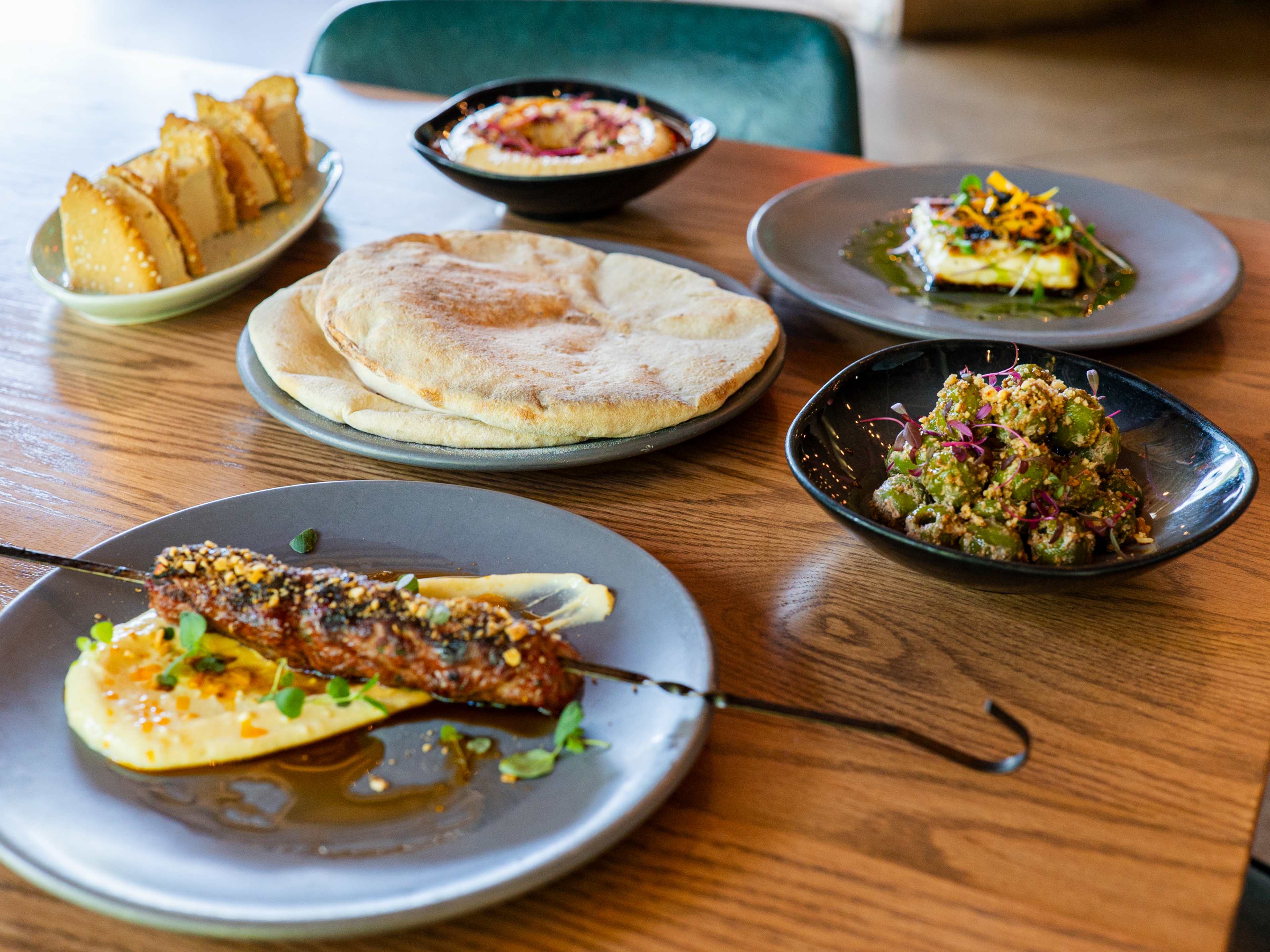 Spread of mezze on a table from Lyra.