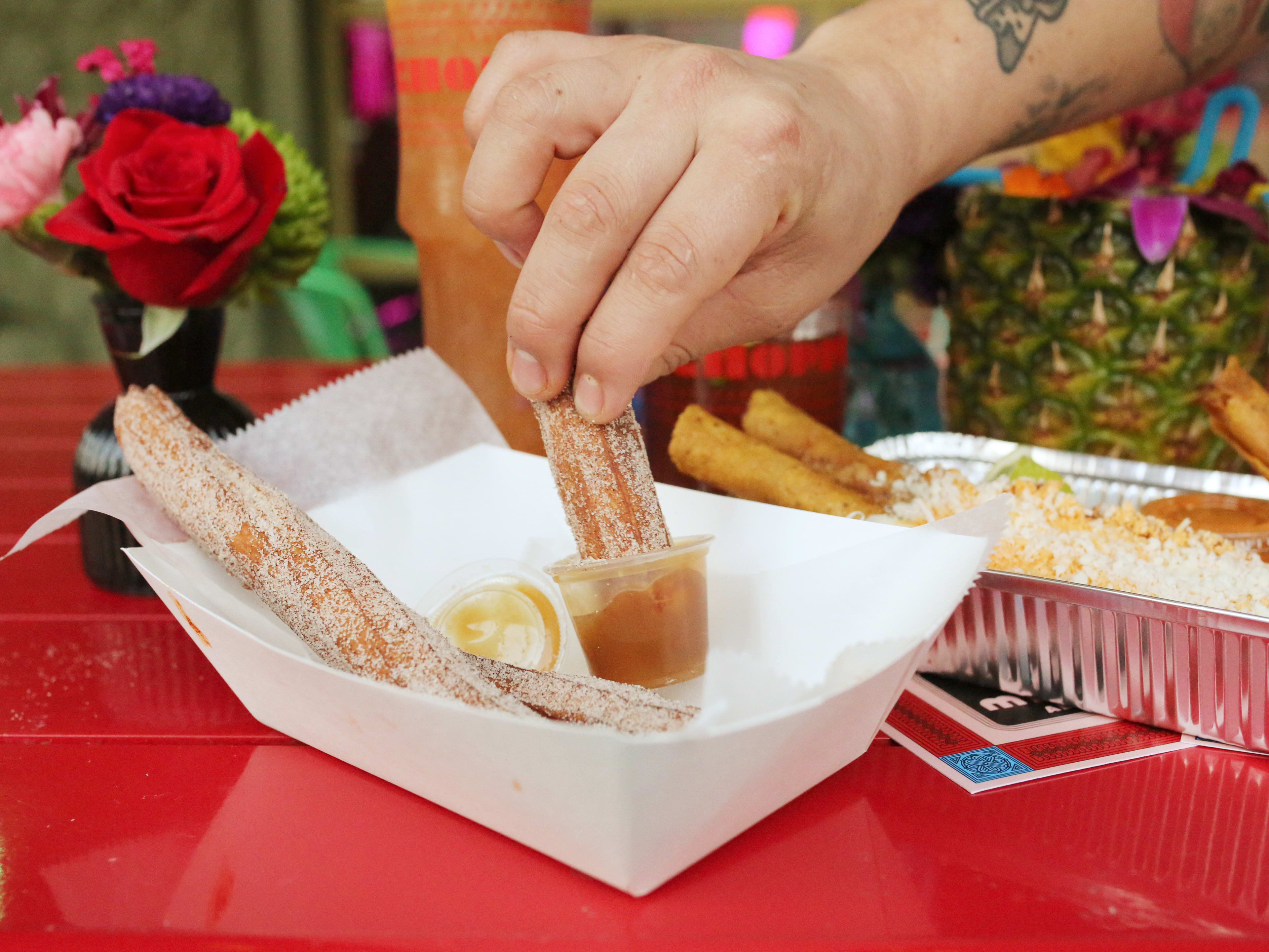 Churros dipped in caramel sauce at Maiz de la Vida