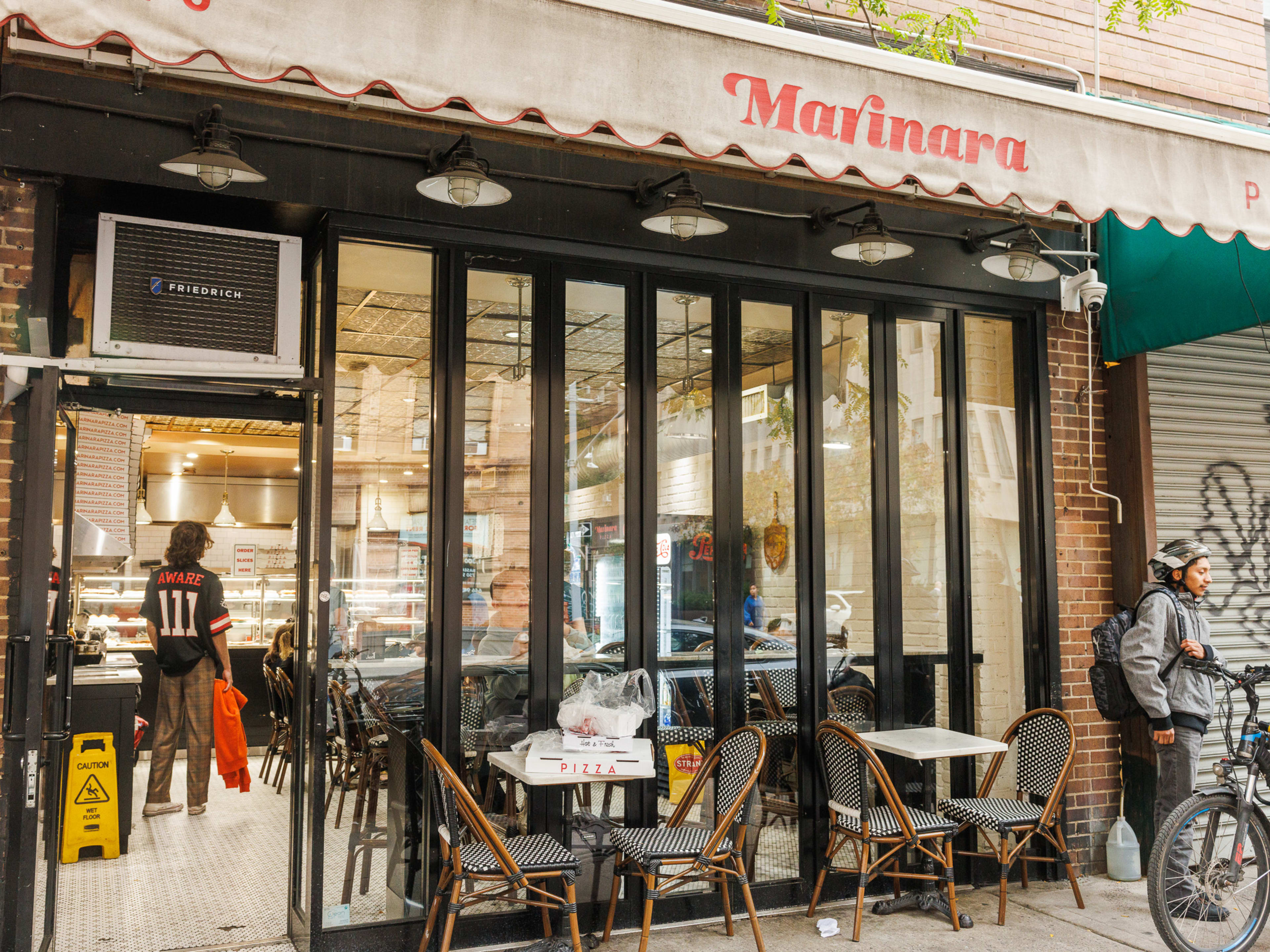 Exterior at Marinara Pizza with outdoor tables