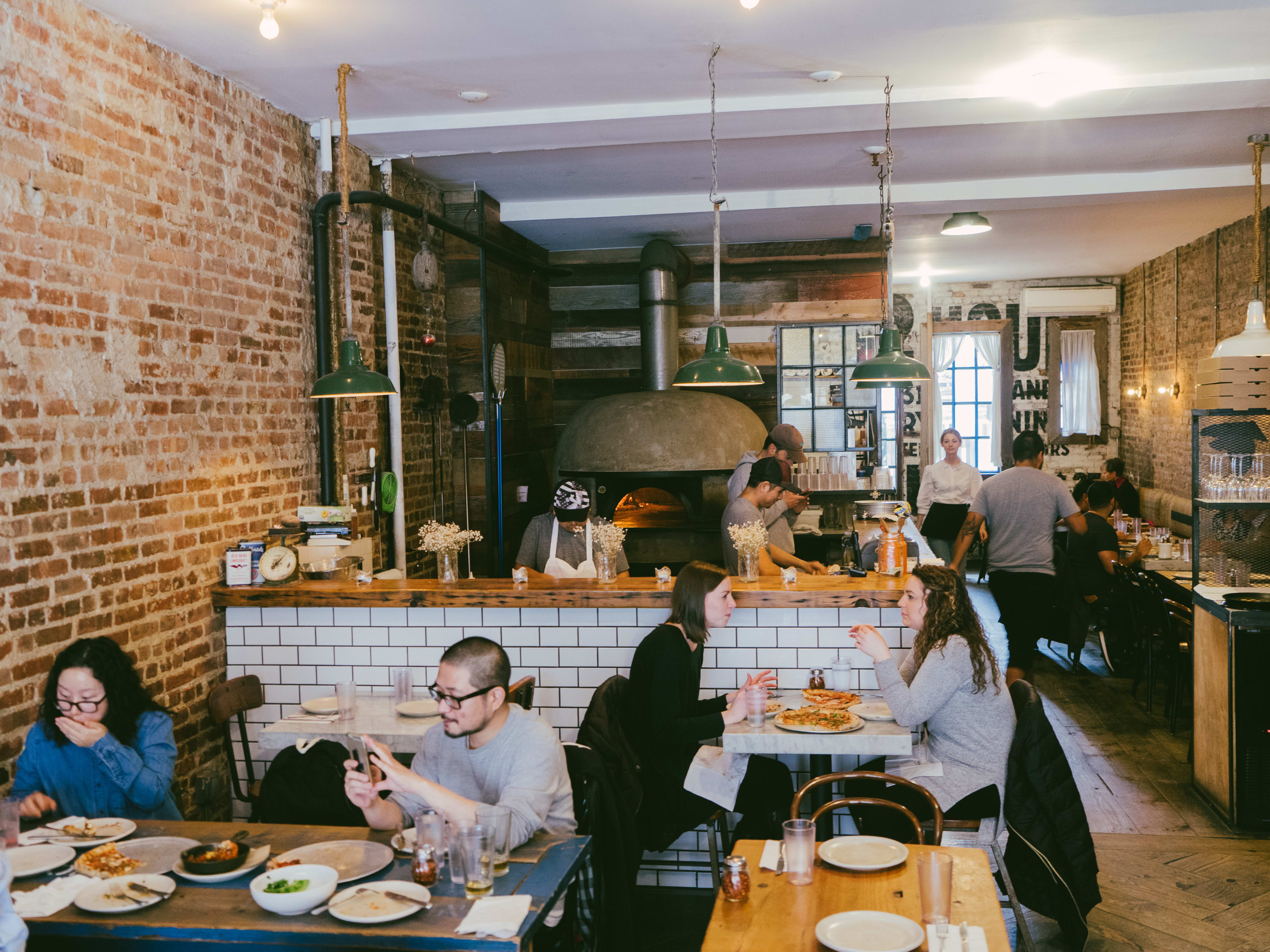 People dine inside Milkflower.