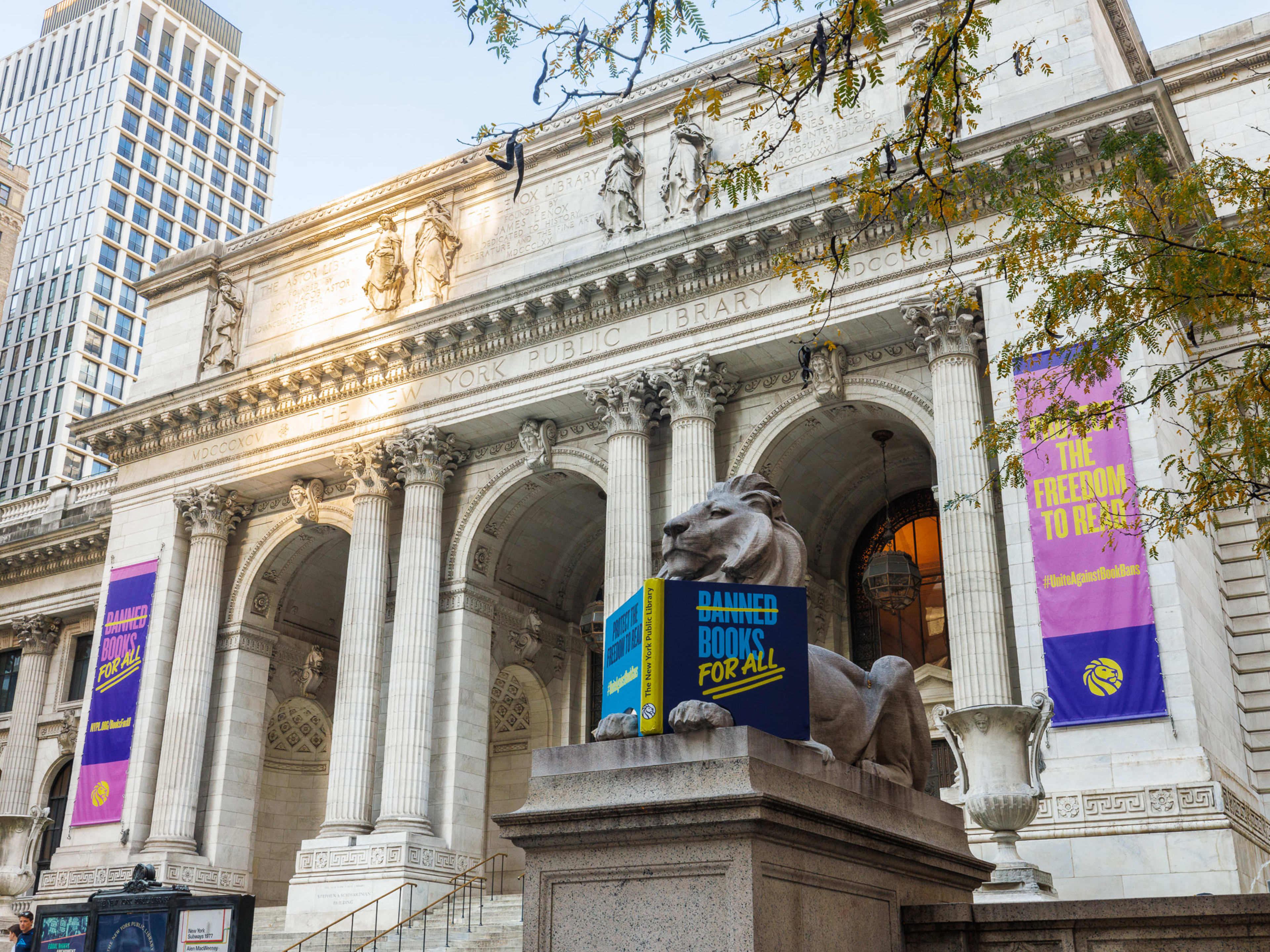 The New York Public Library exterior with columns and stone lion statues