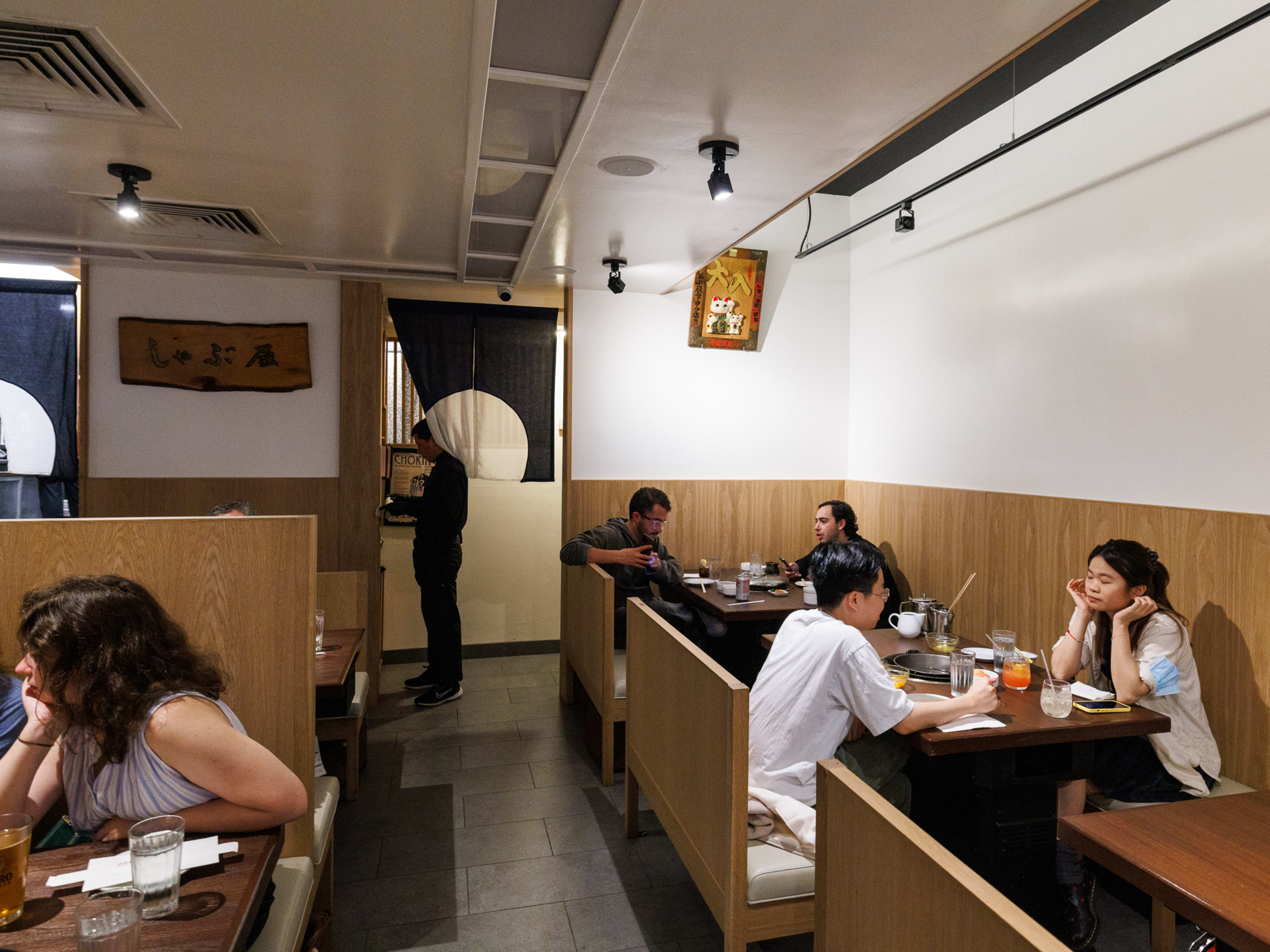 Shabu-Tatsu interior with wooden booth seating