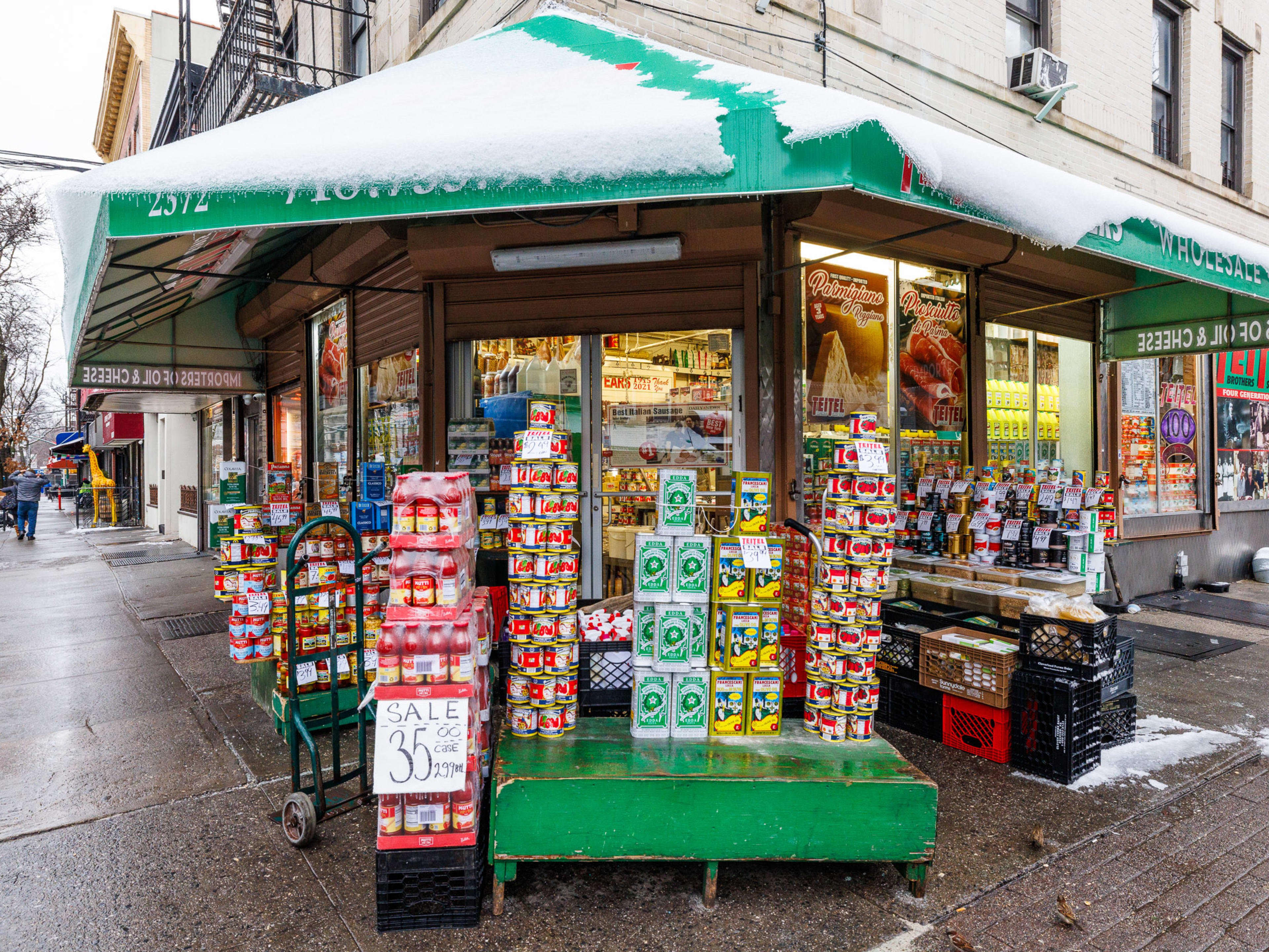 Teitel Brothers exterior with products on display on the sidewalk