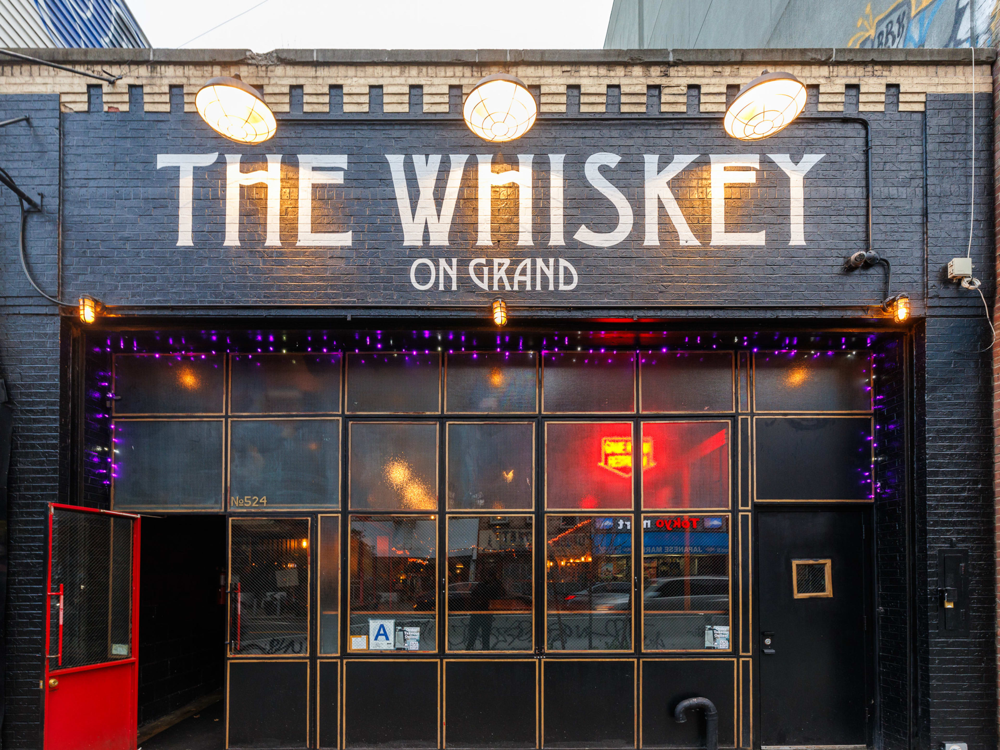 Exterior at The Whiskey on Grand with big windows