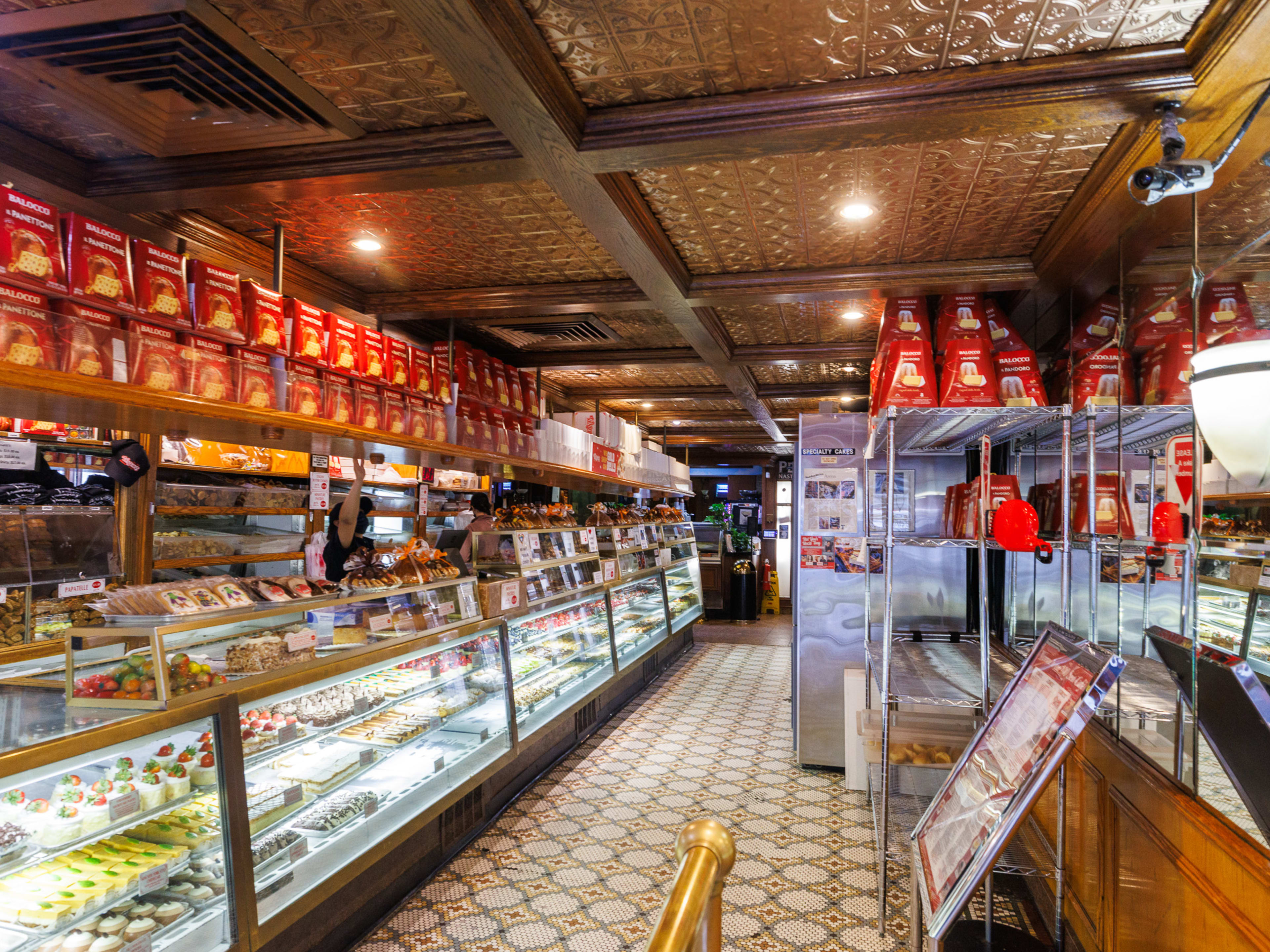 Interior at Veniero’s Pasticceria & Caffe with bakery display counter filled with pastries