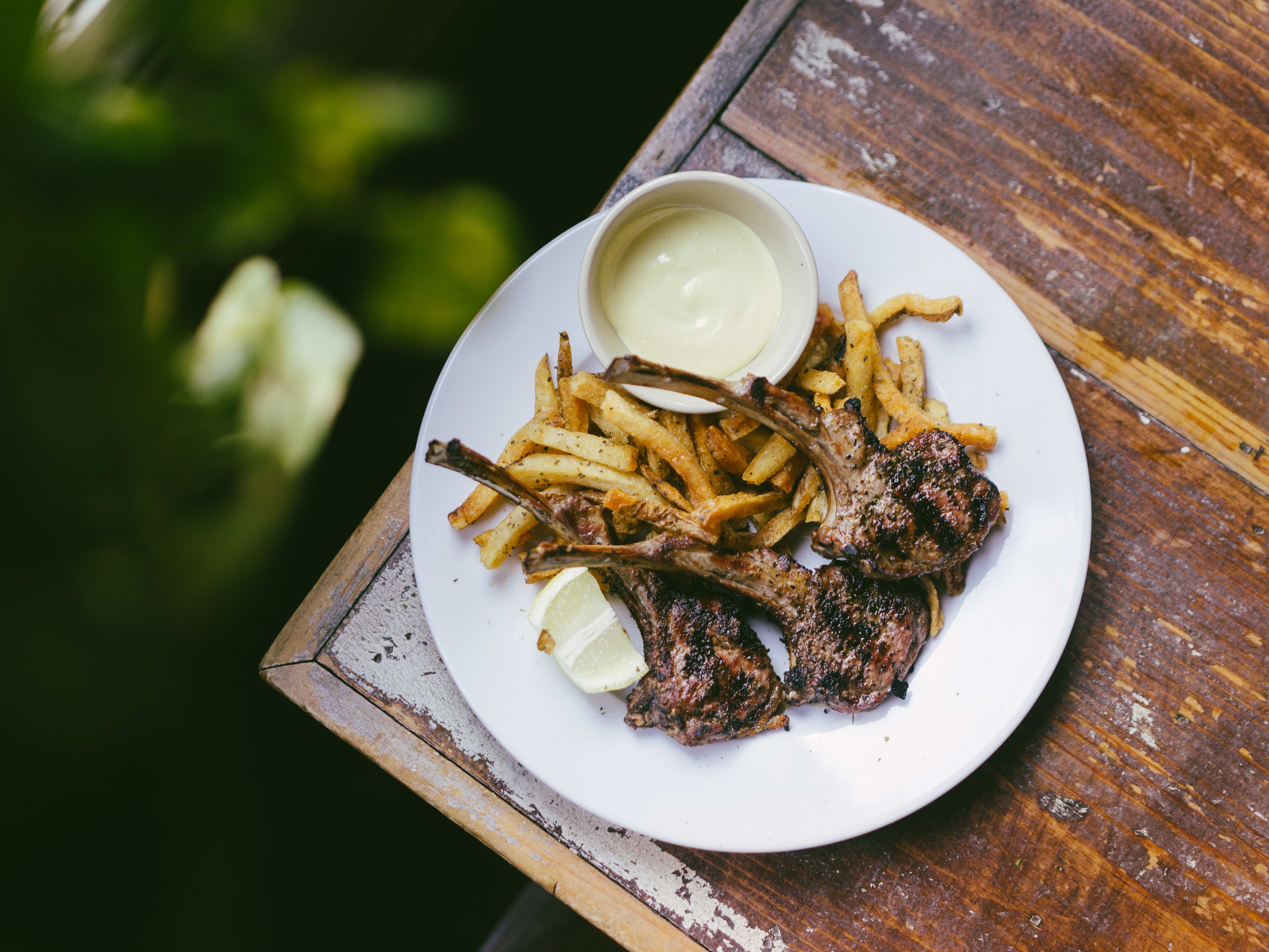 Kiki’s Grill & Rotisserie plate of lamb, fries, and a dipping sauce