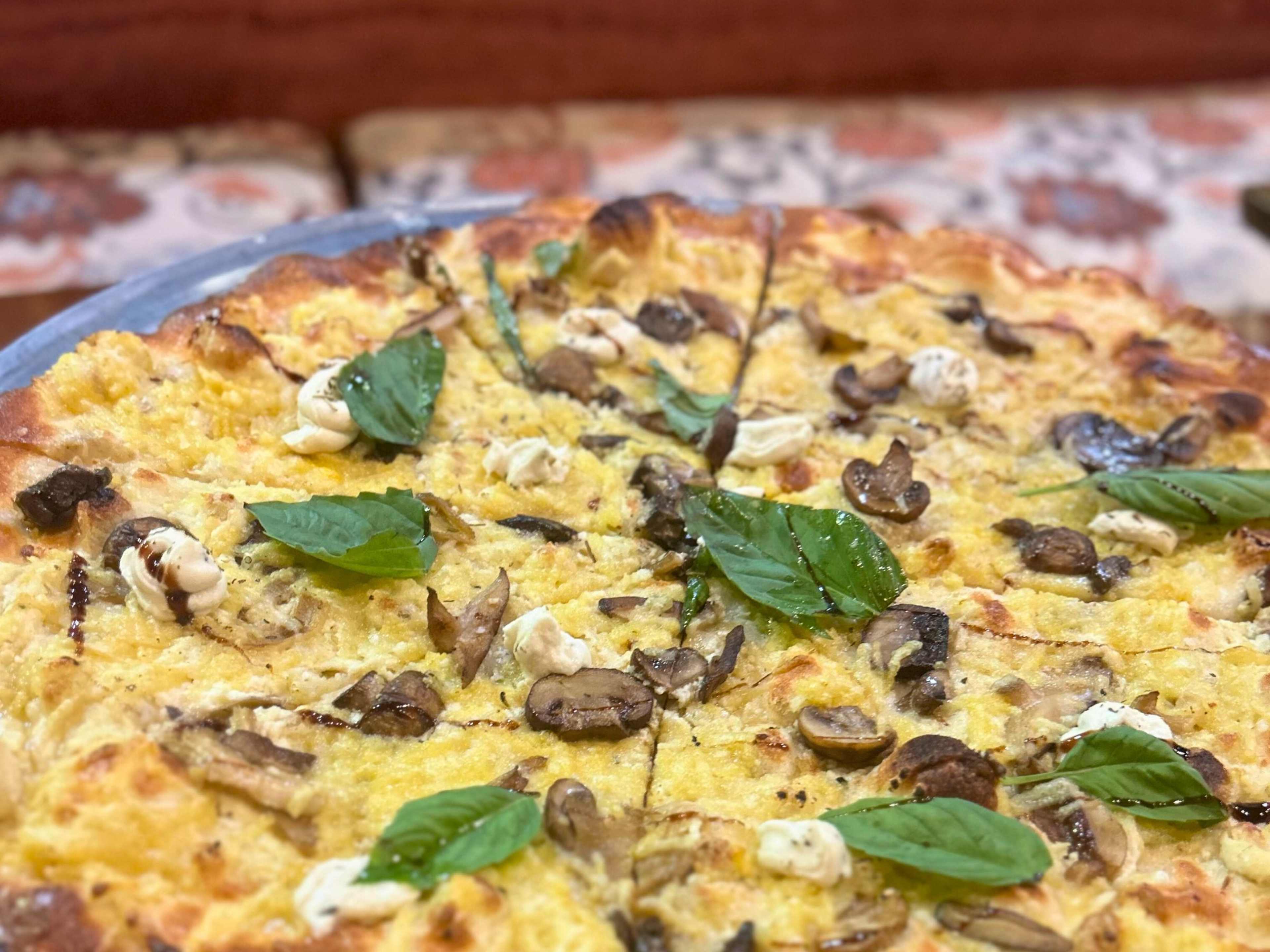 vegan pizza with mushrooms and basil