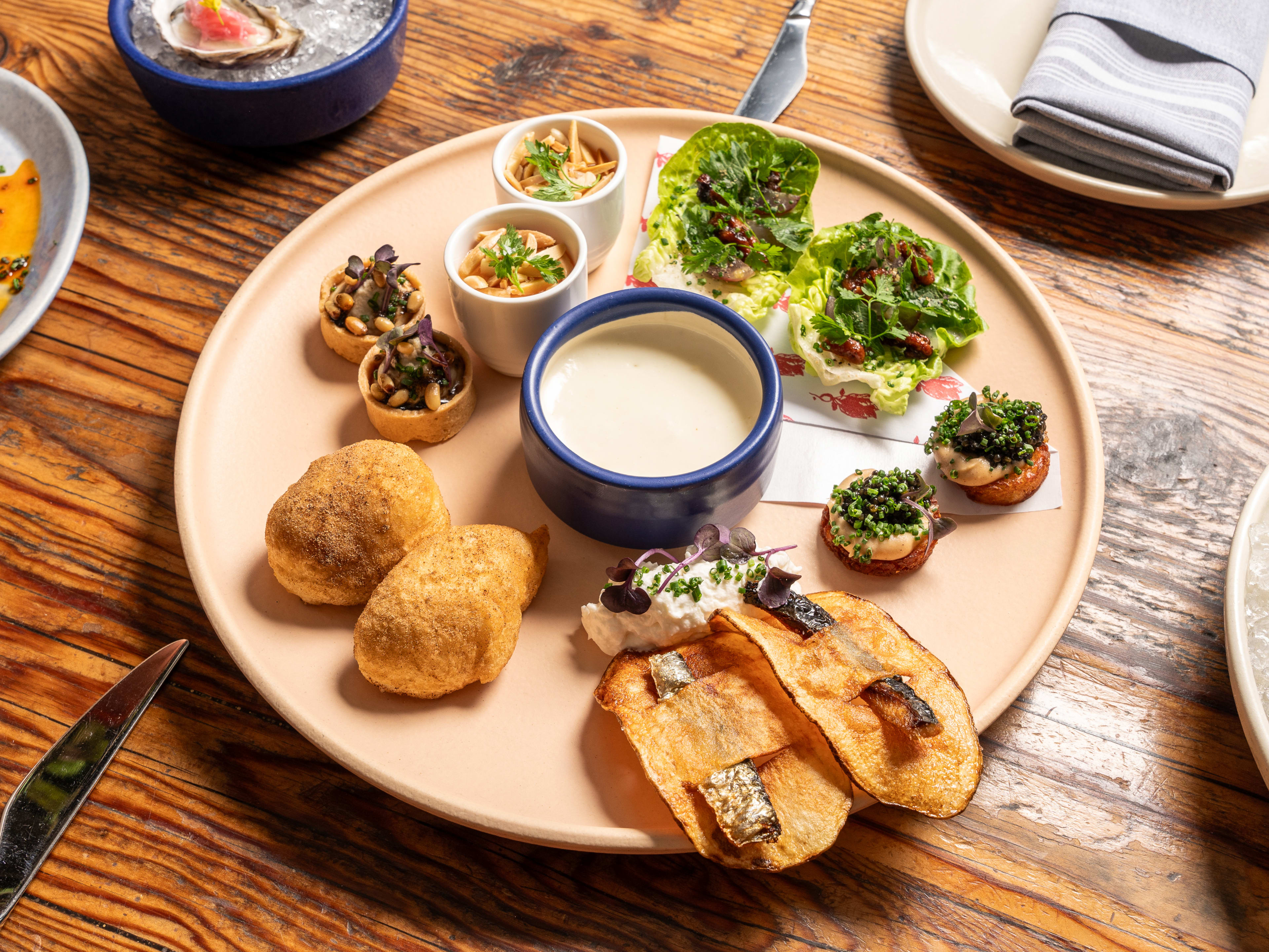 The tasting menu sampler platter at Rich Table