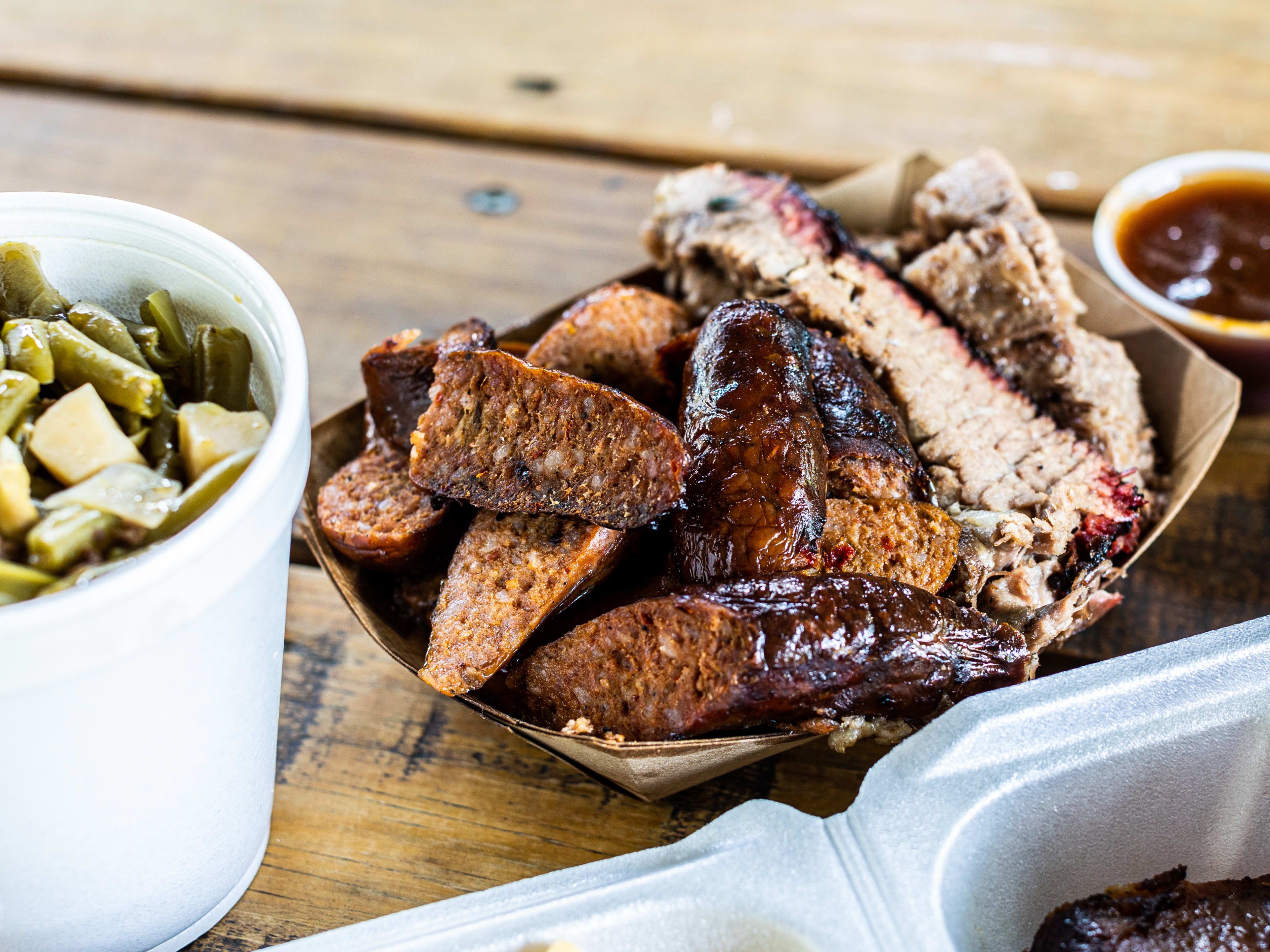 sausage links, brisket, and green beans