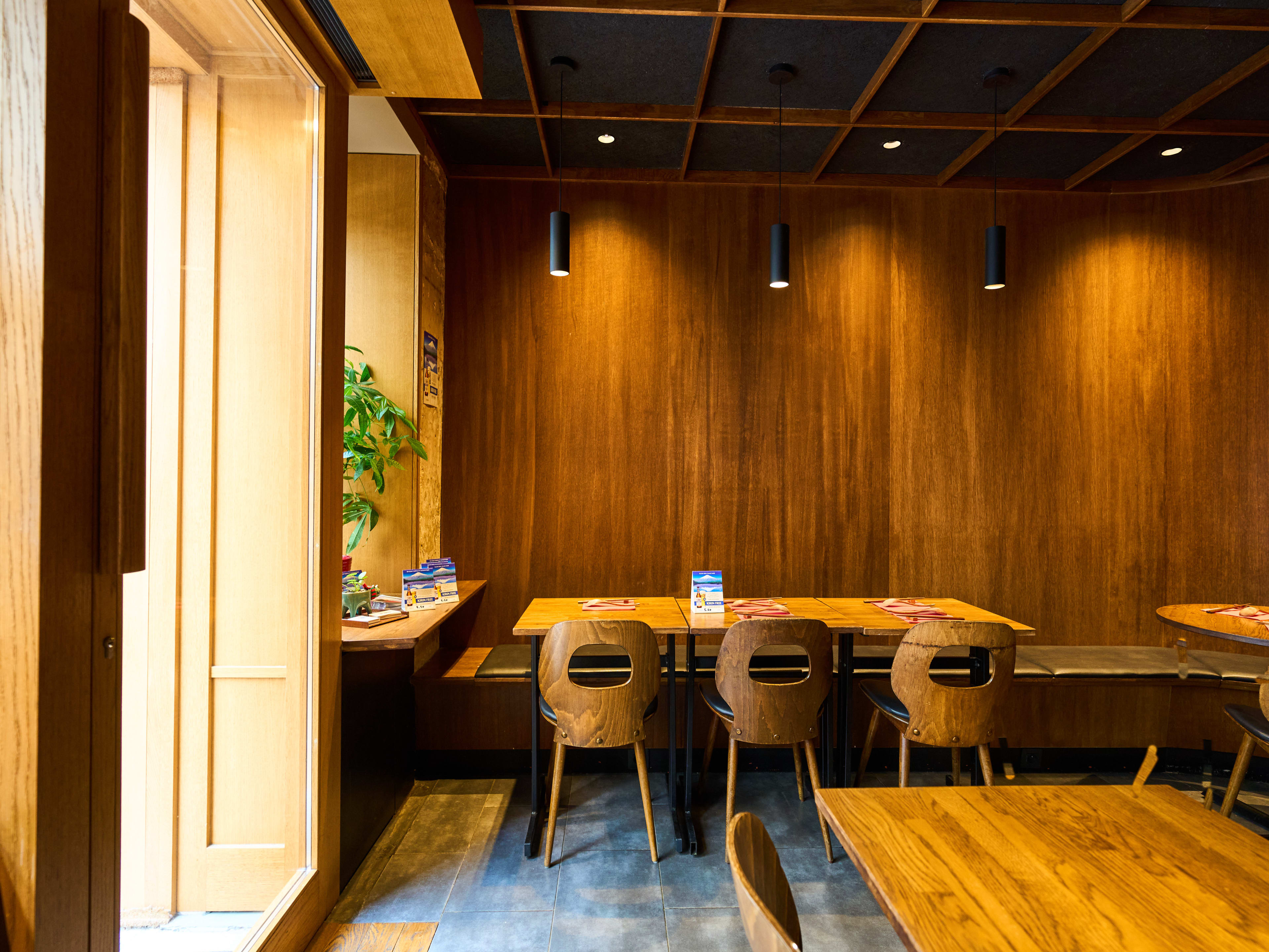 Wood-laden interior dining room at Ryukishin Eiffel