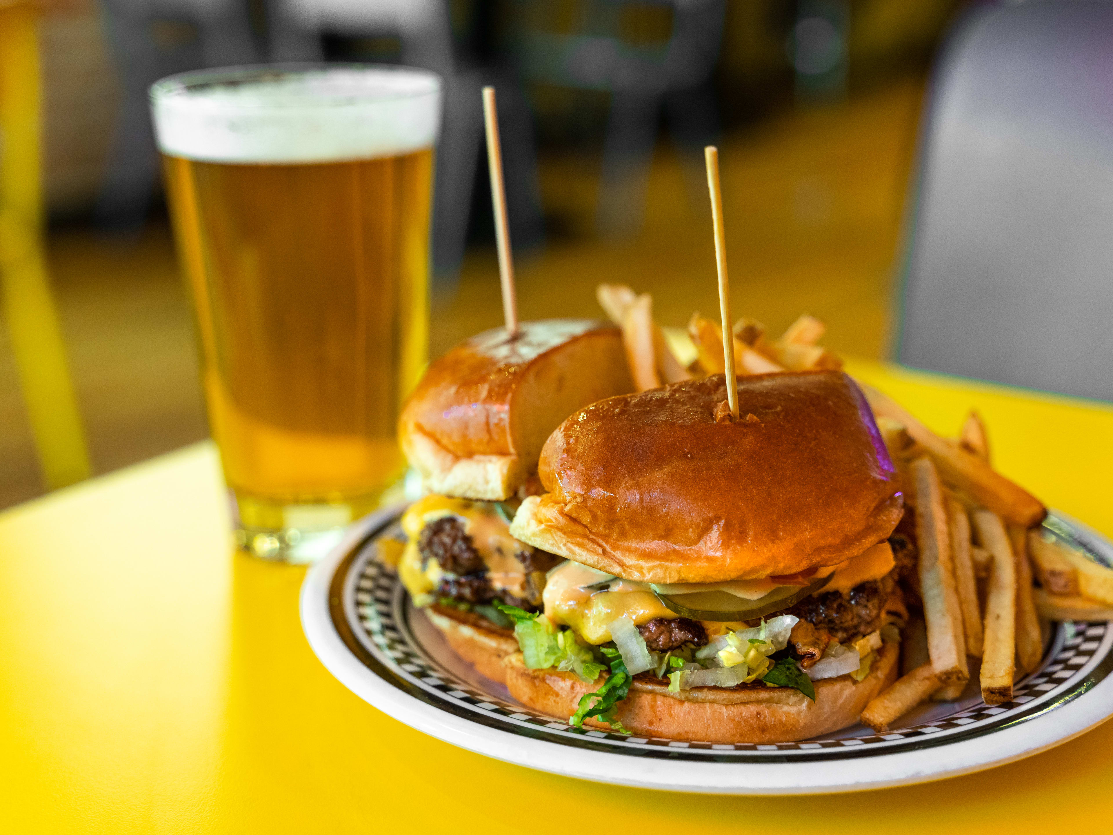 This famed bar transforms into a restaurant — and the garlic burgers are  back