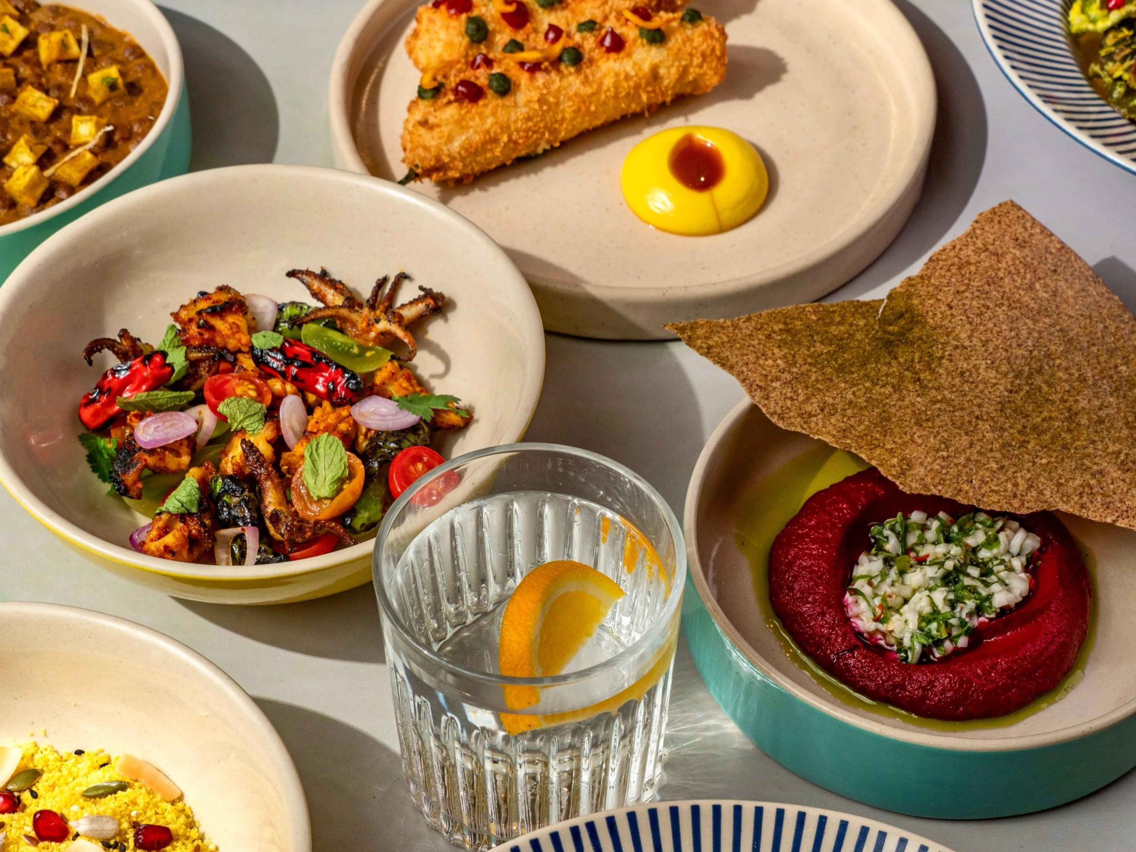 Spread of signature dishes at The Bombay Canteen