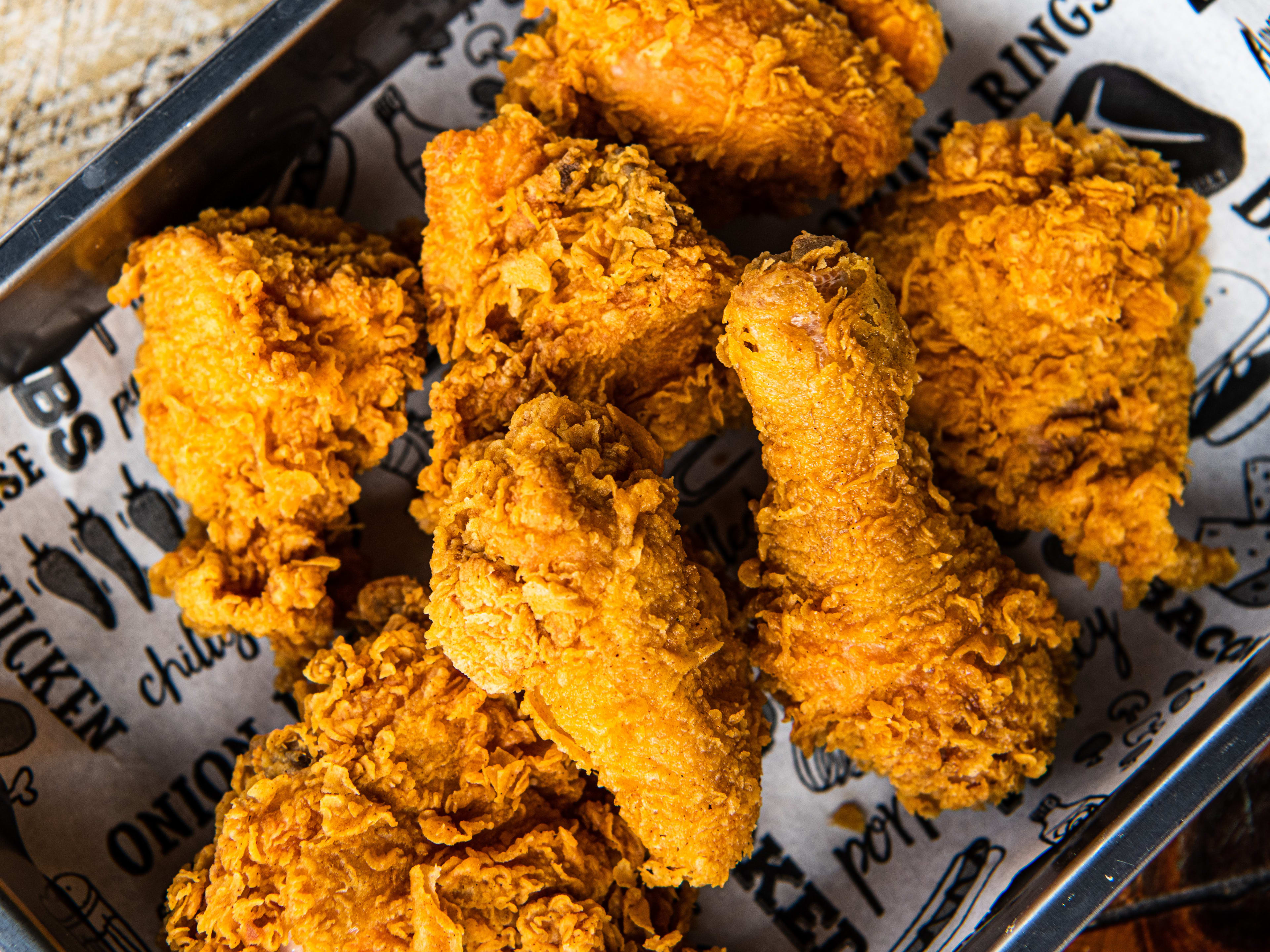 Fried chicken on a metal platter