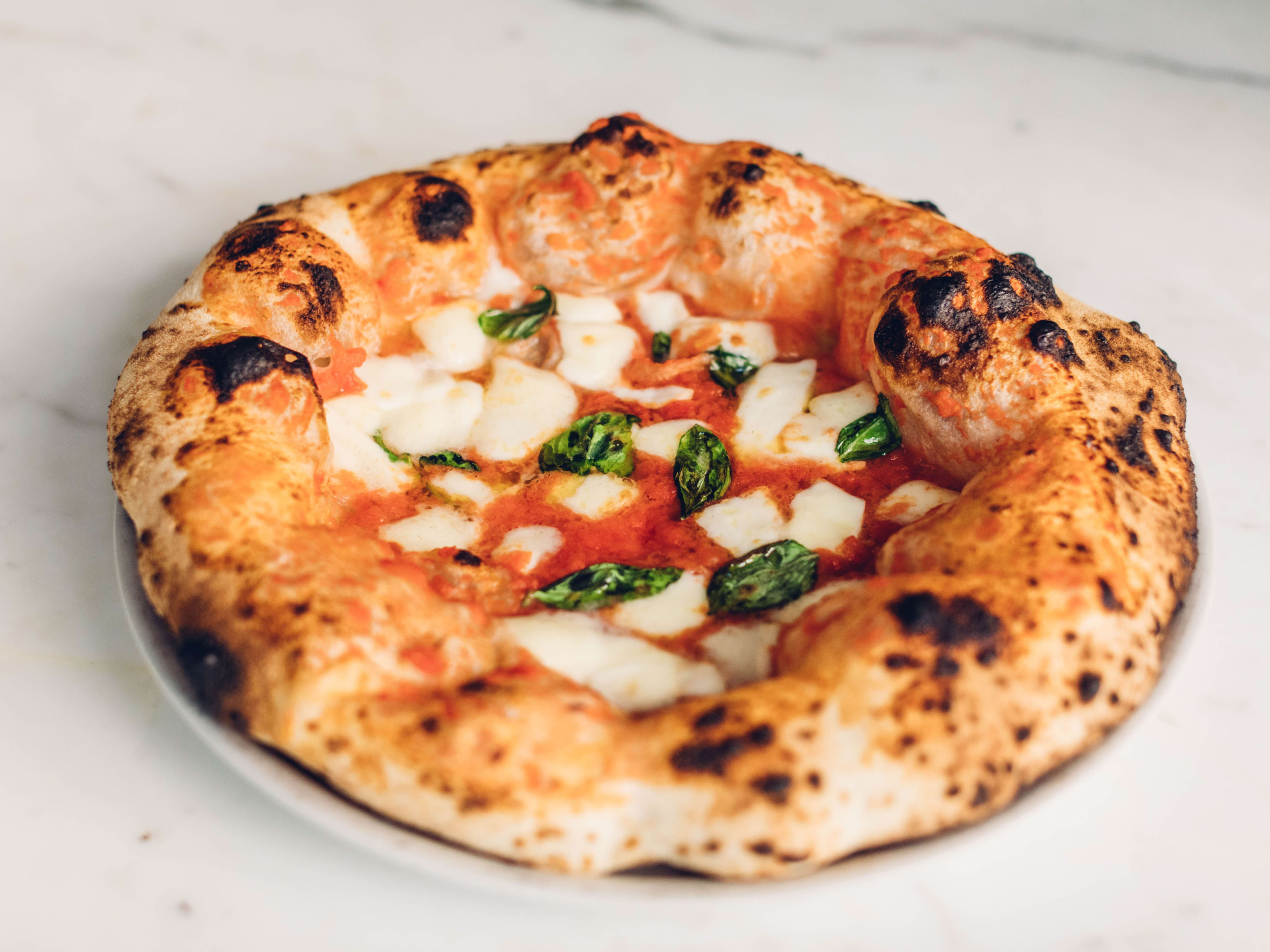 a margherita pizza from una pizza napoletana