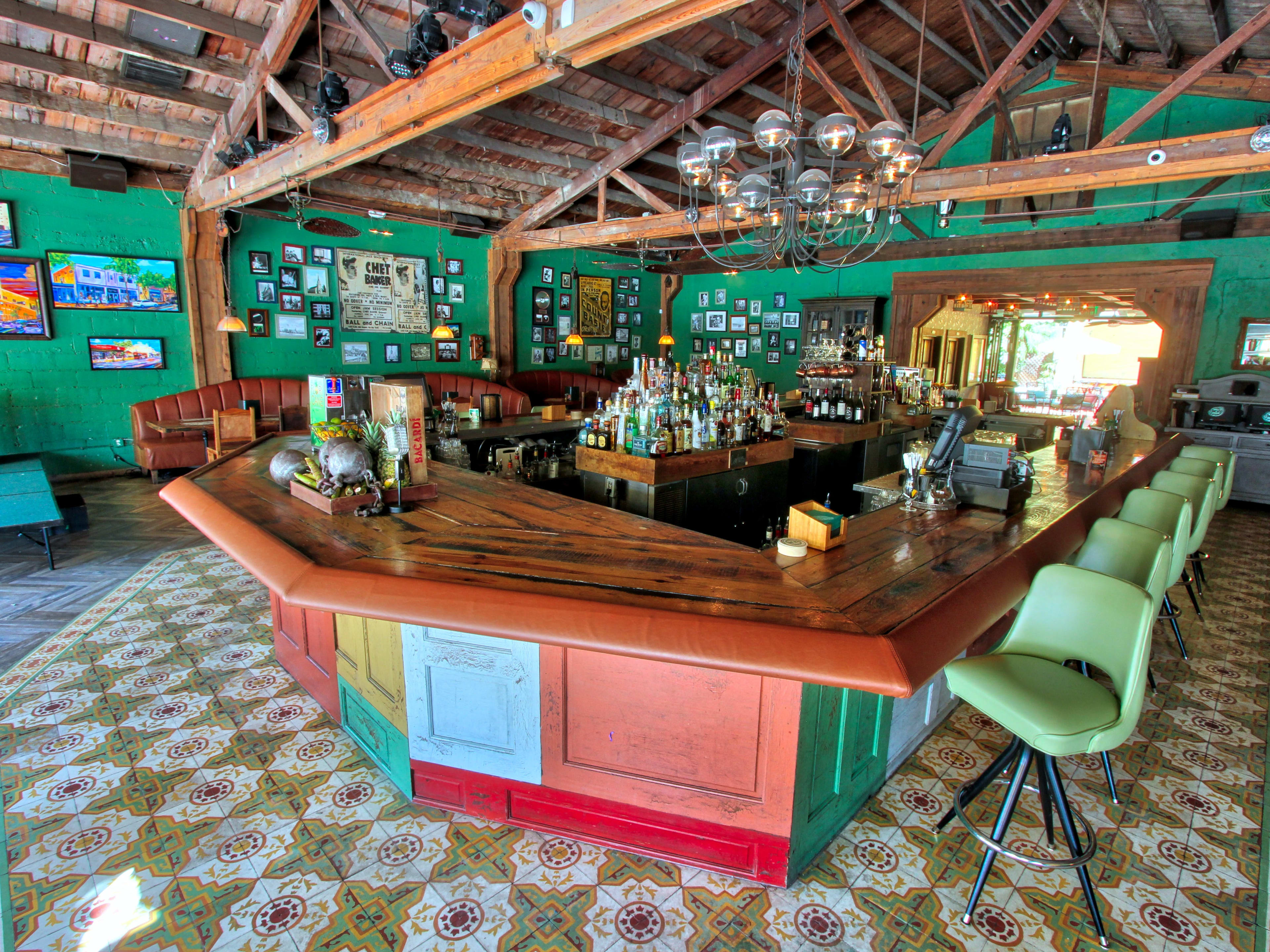 interior of bar with colorful furniture and floor tiling