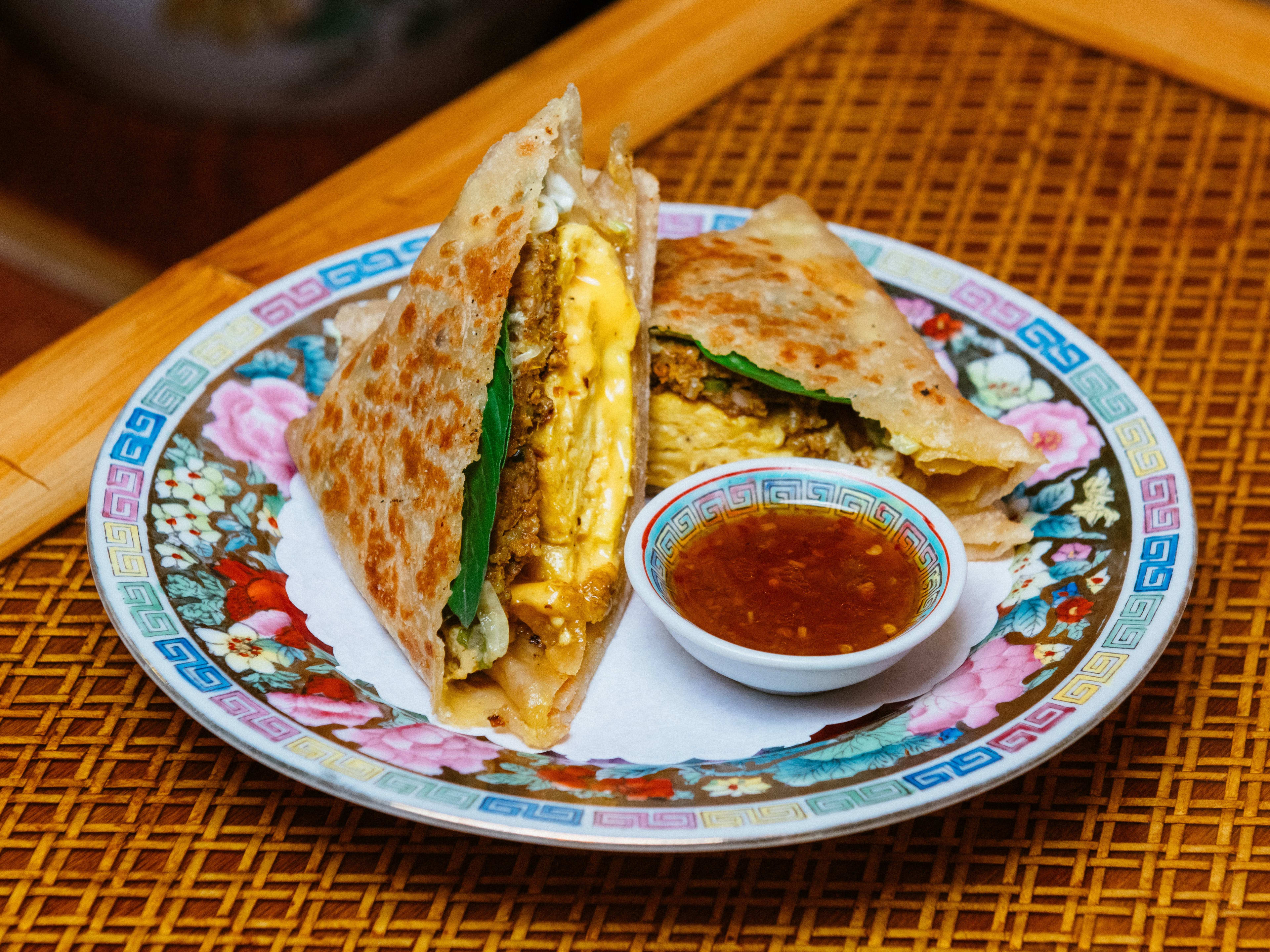 Sausage egg and cheese on a roti from Thai Diner.