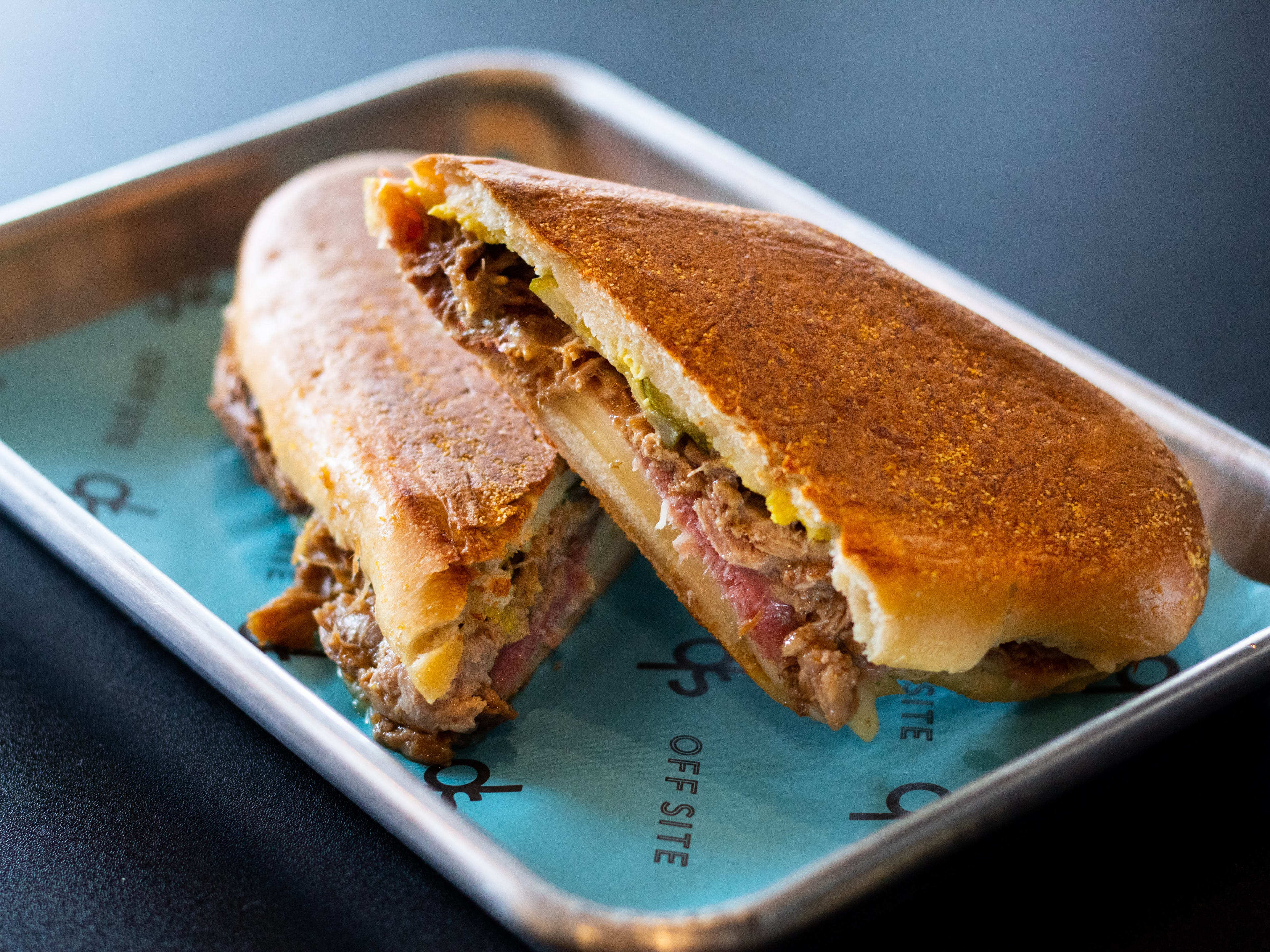 cuban sandwich on a metal tray