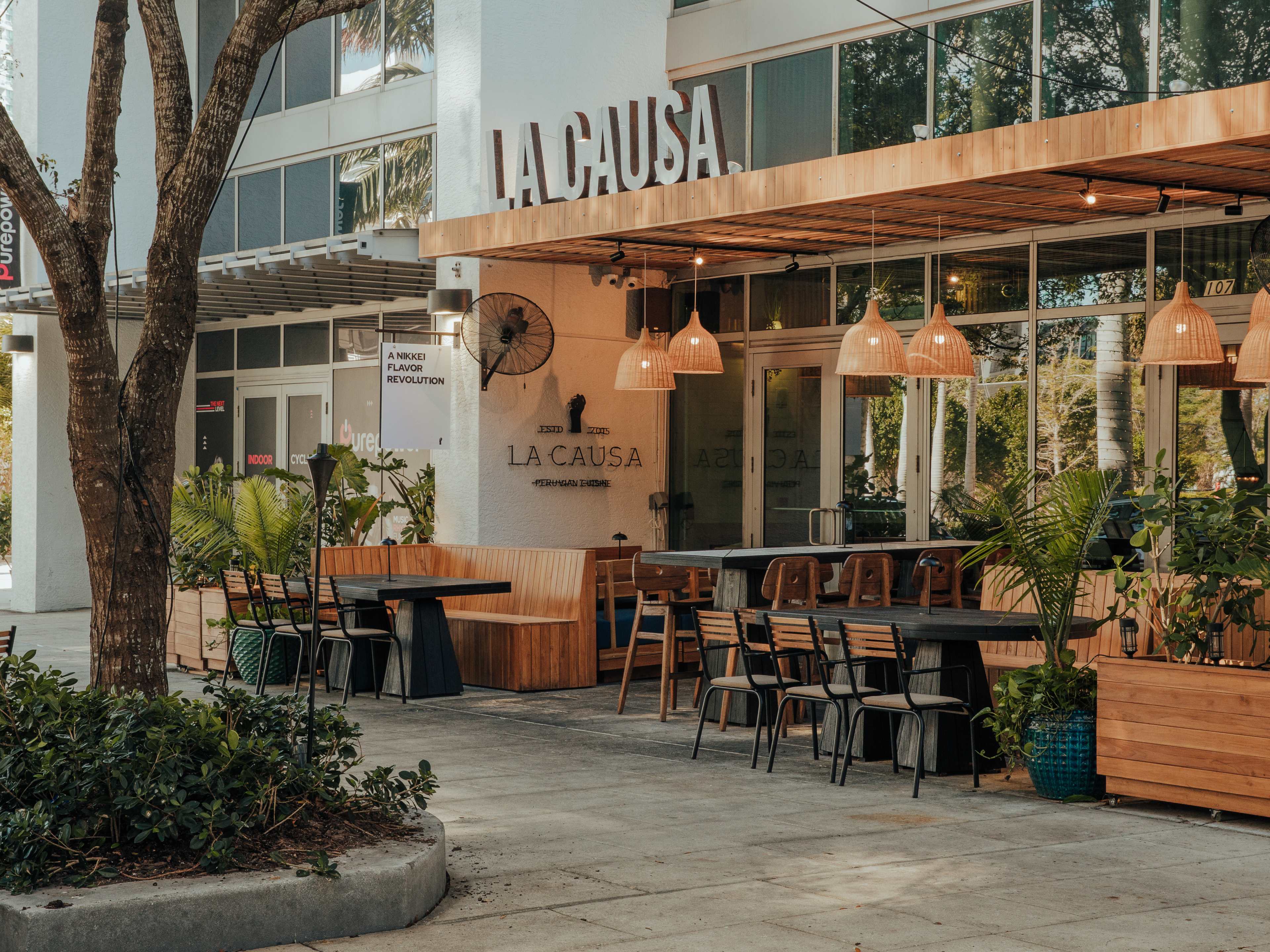 exterior of la causa, lots of plants and outdoor seating