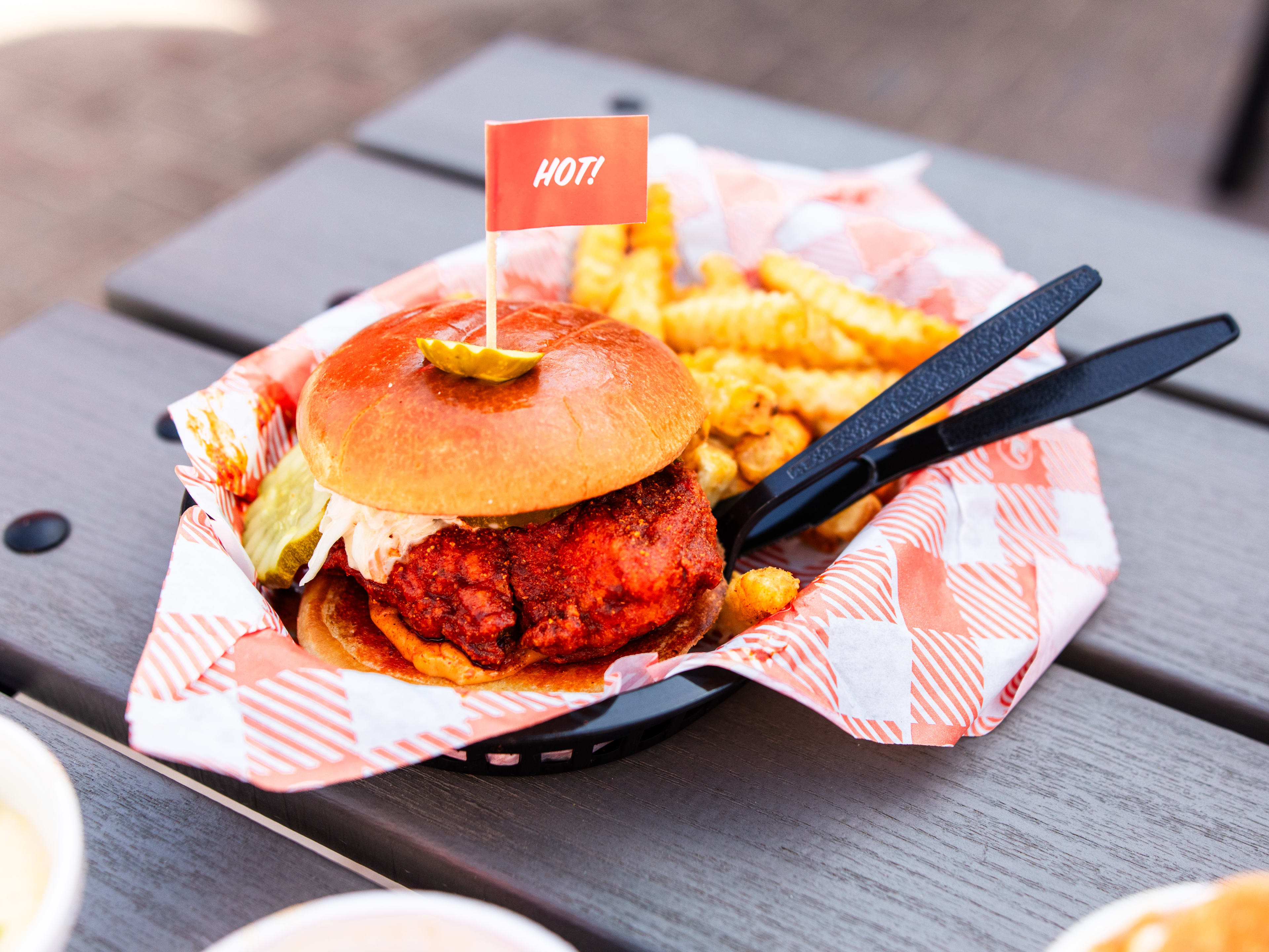 The fried chicken sandwich with fries from Hattie B’s.