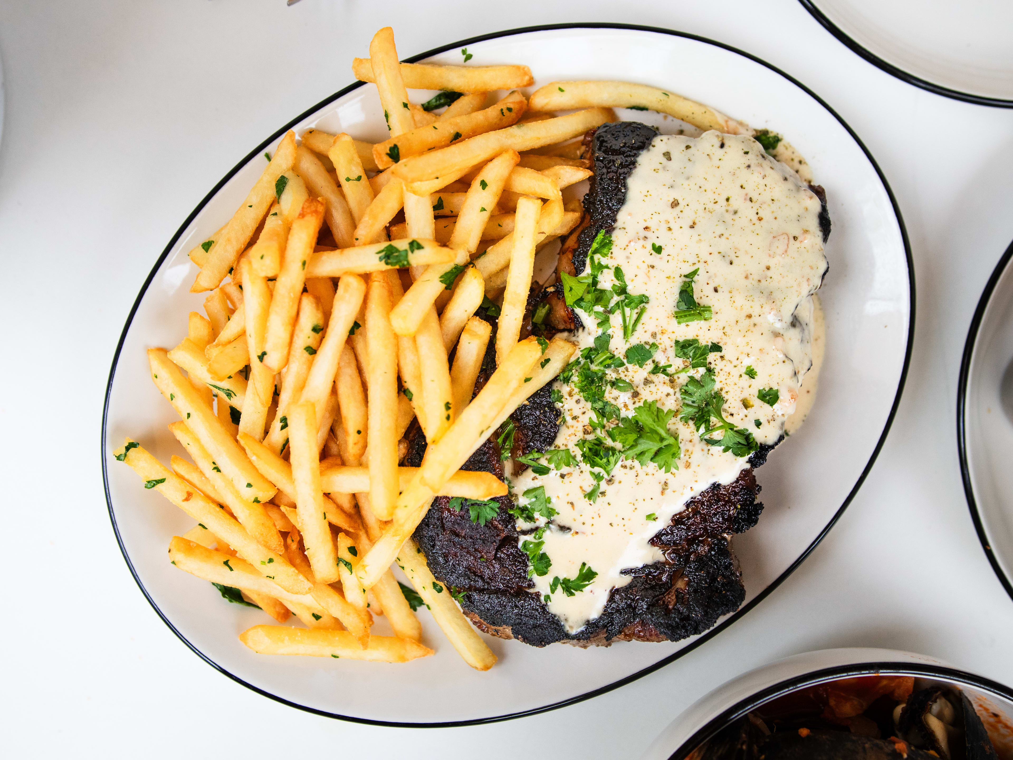 A plate of steak frites