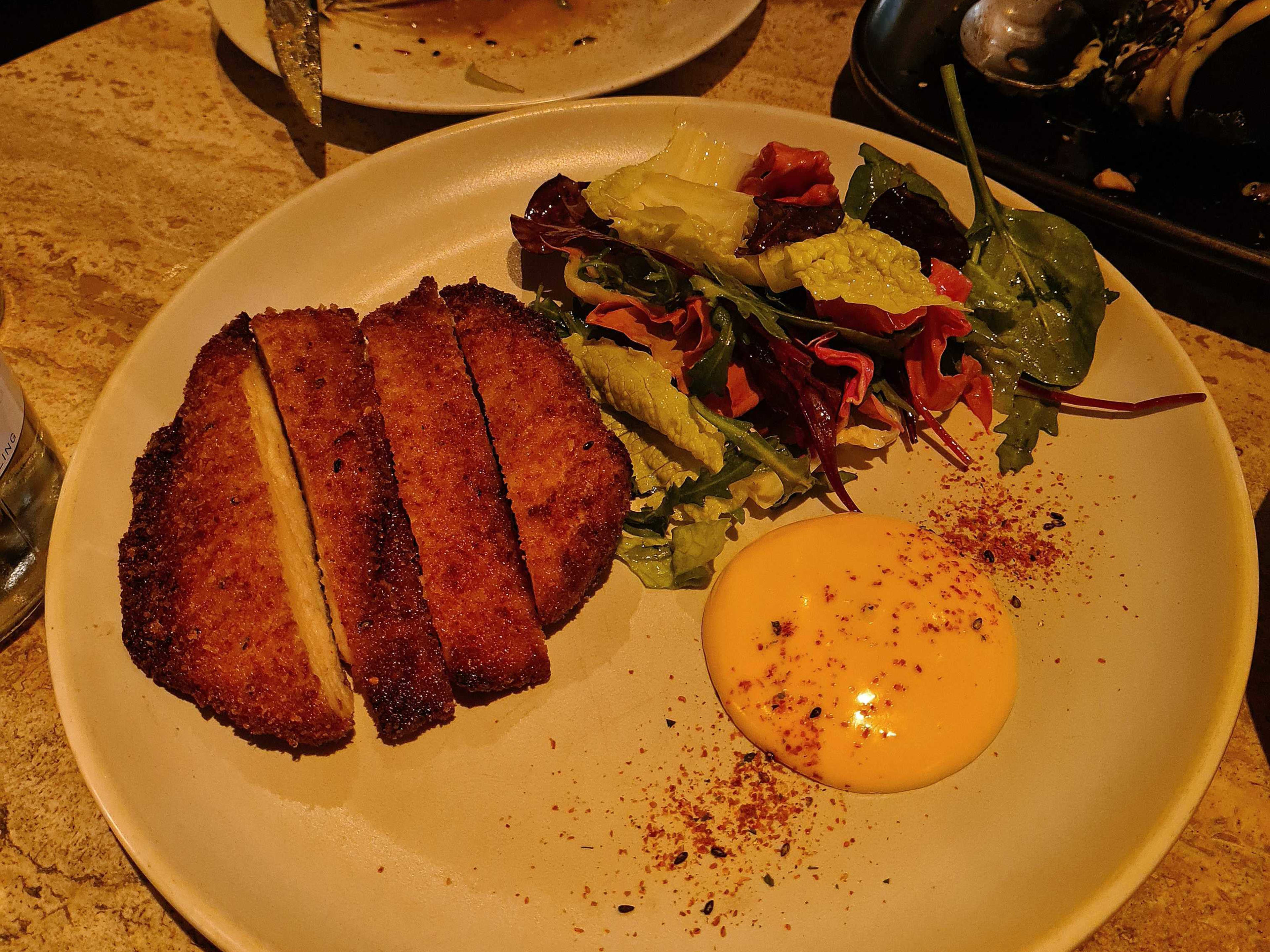 The koji-marinated chicken schnitzel at Milk Beach in Soho.