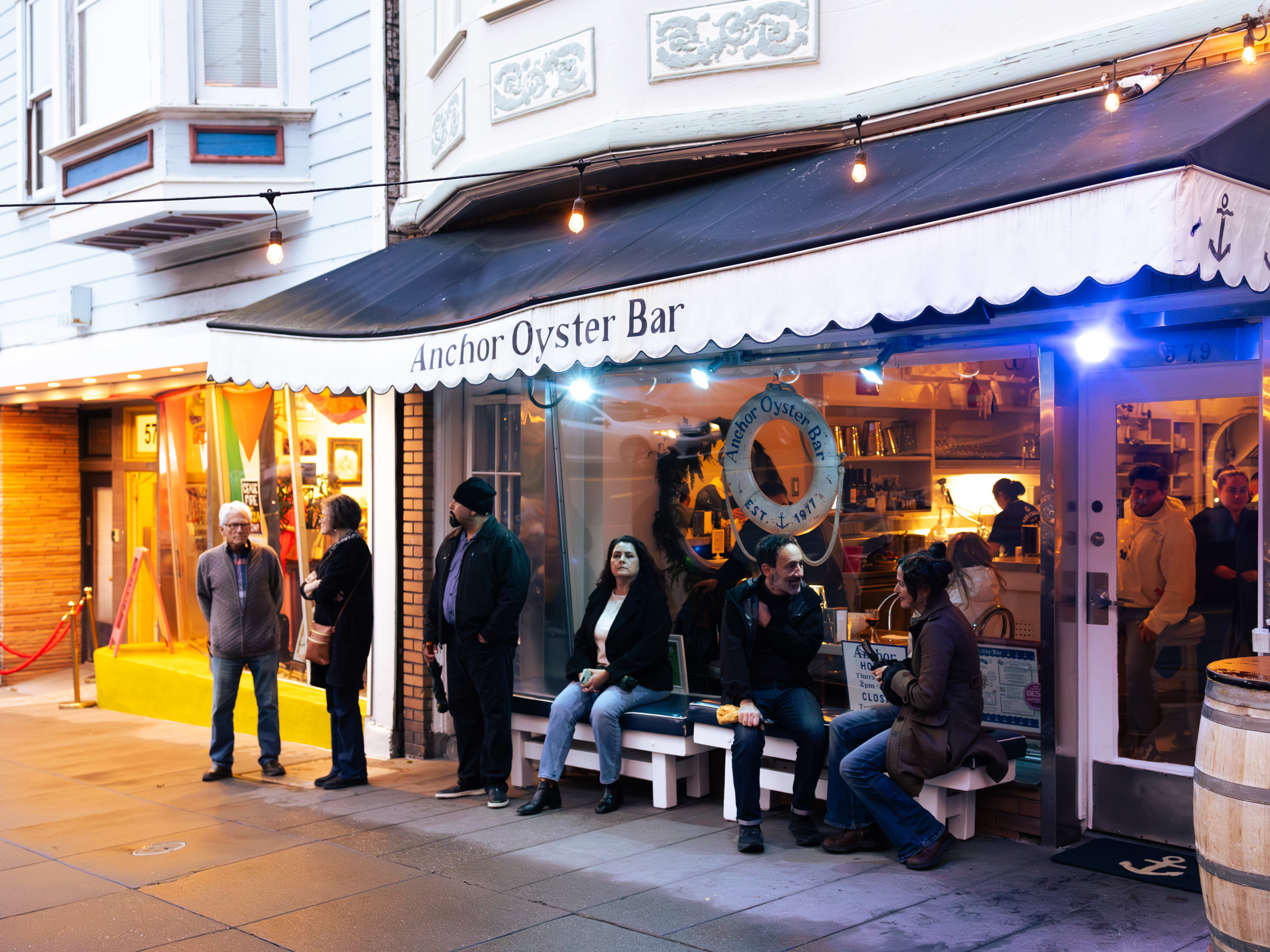 People waiting for a table outside of Anchor Oyster Bar