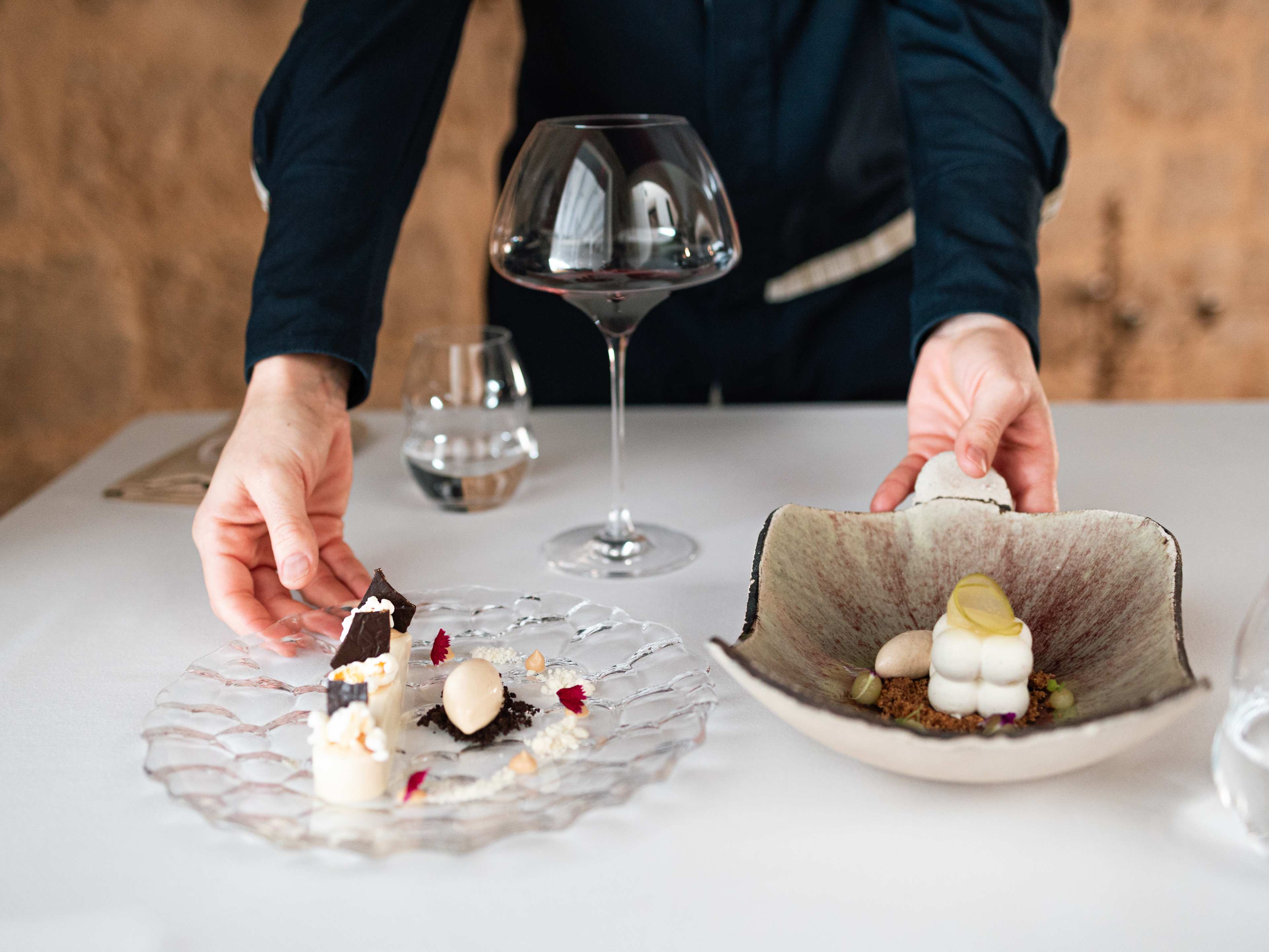 desserts in ornate dishes being served