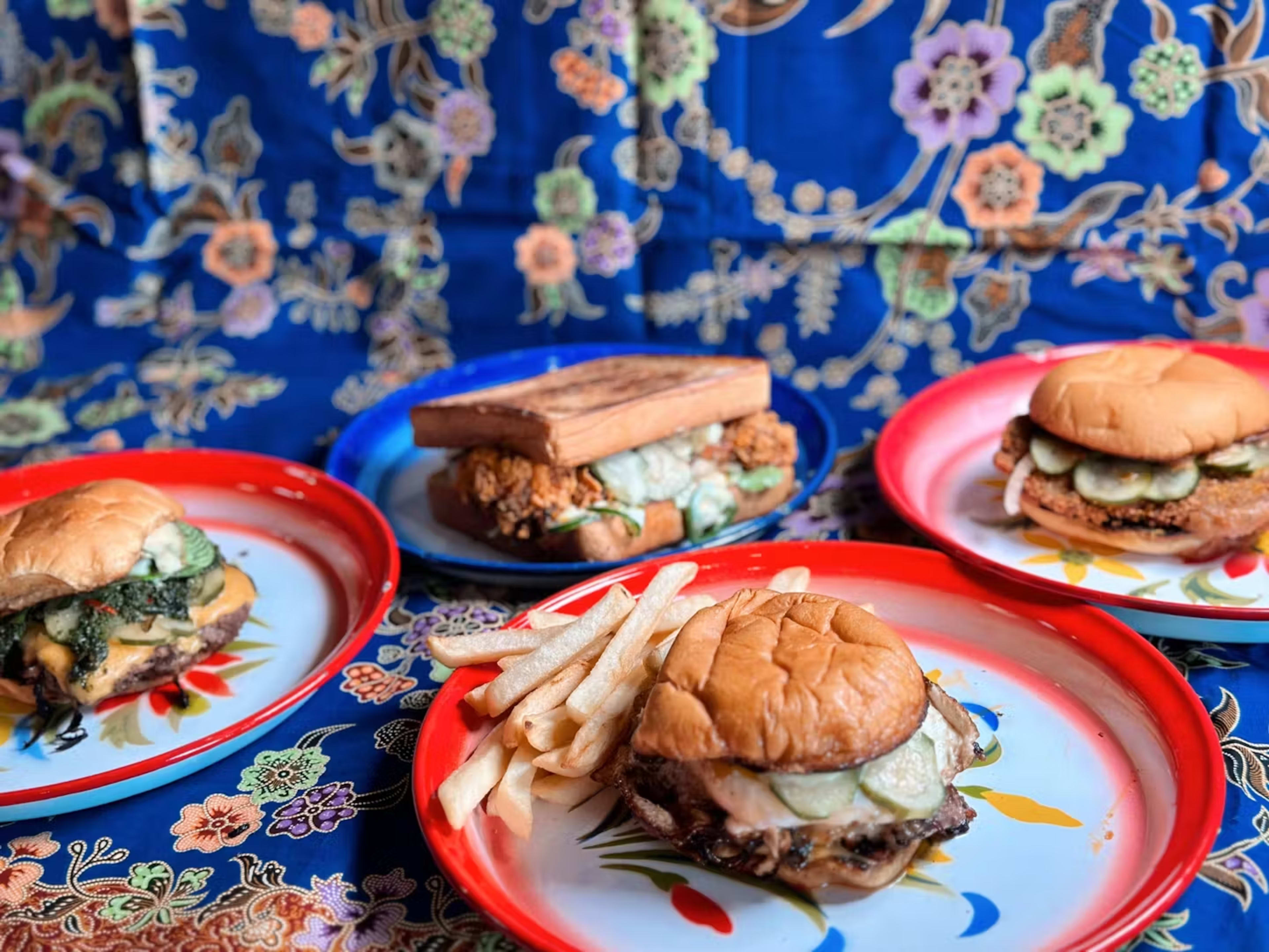 thai smashburgers on plates