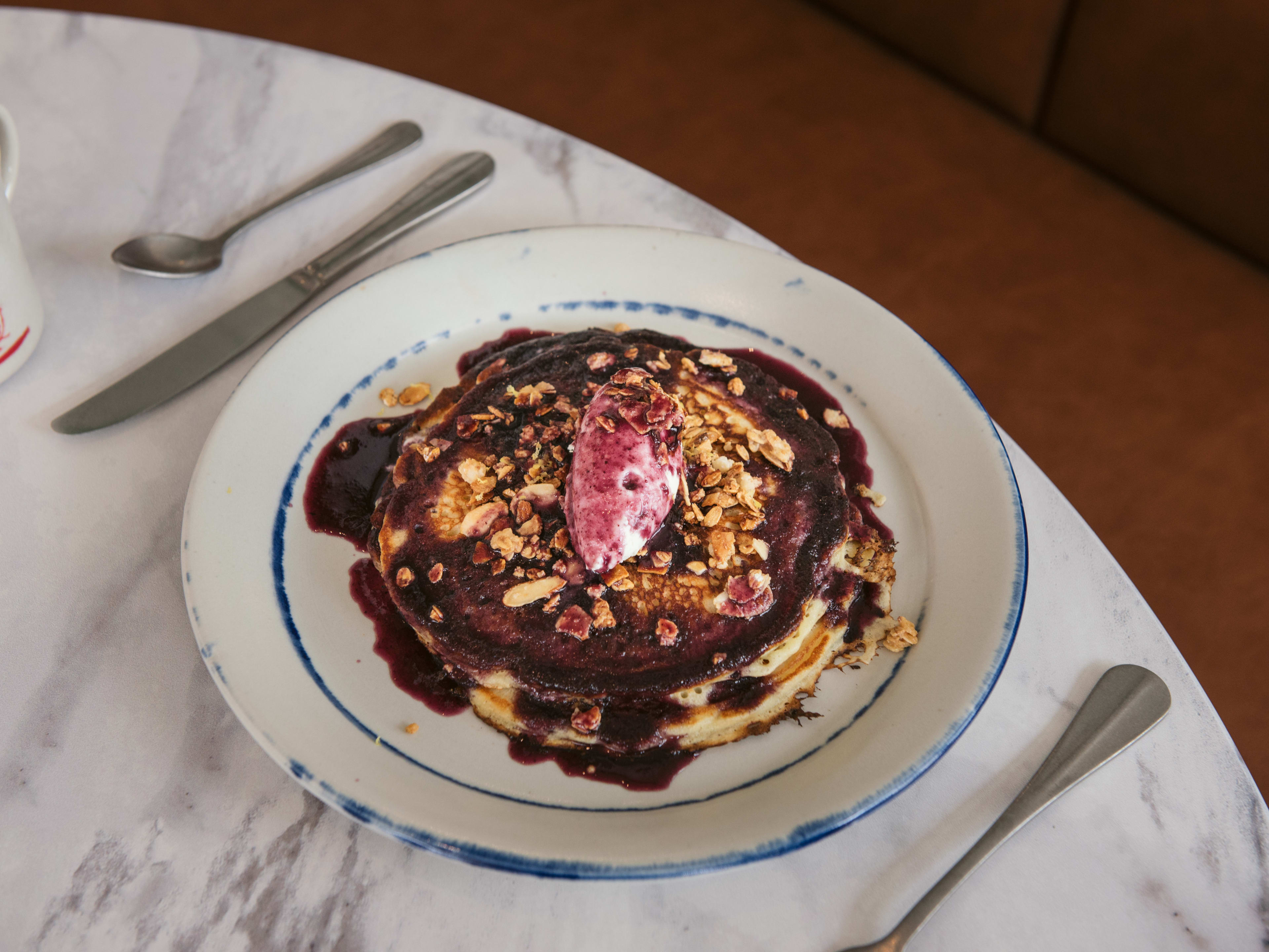 A plate of blueberry pancakes at Early To Rise.