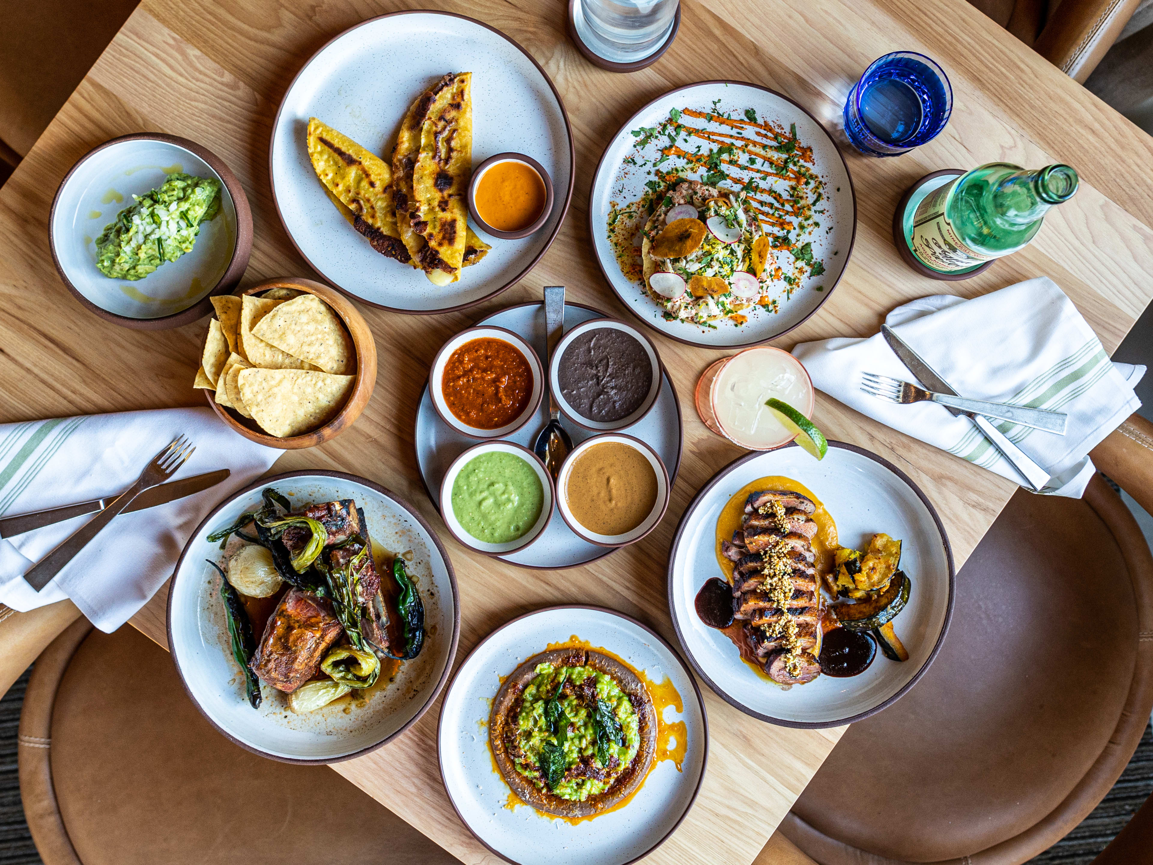 A spread of dishes on a table at Bulevar.