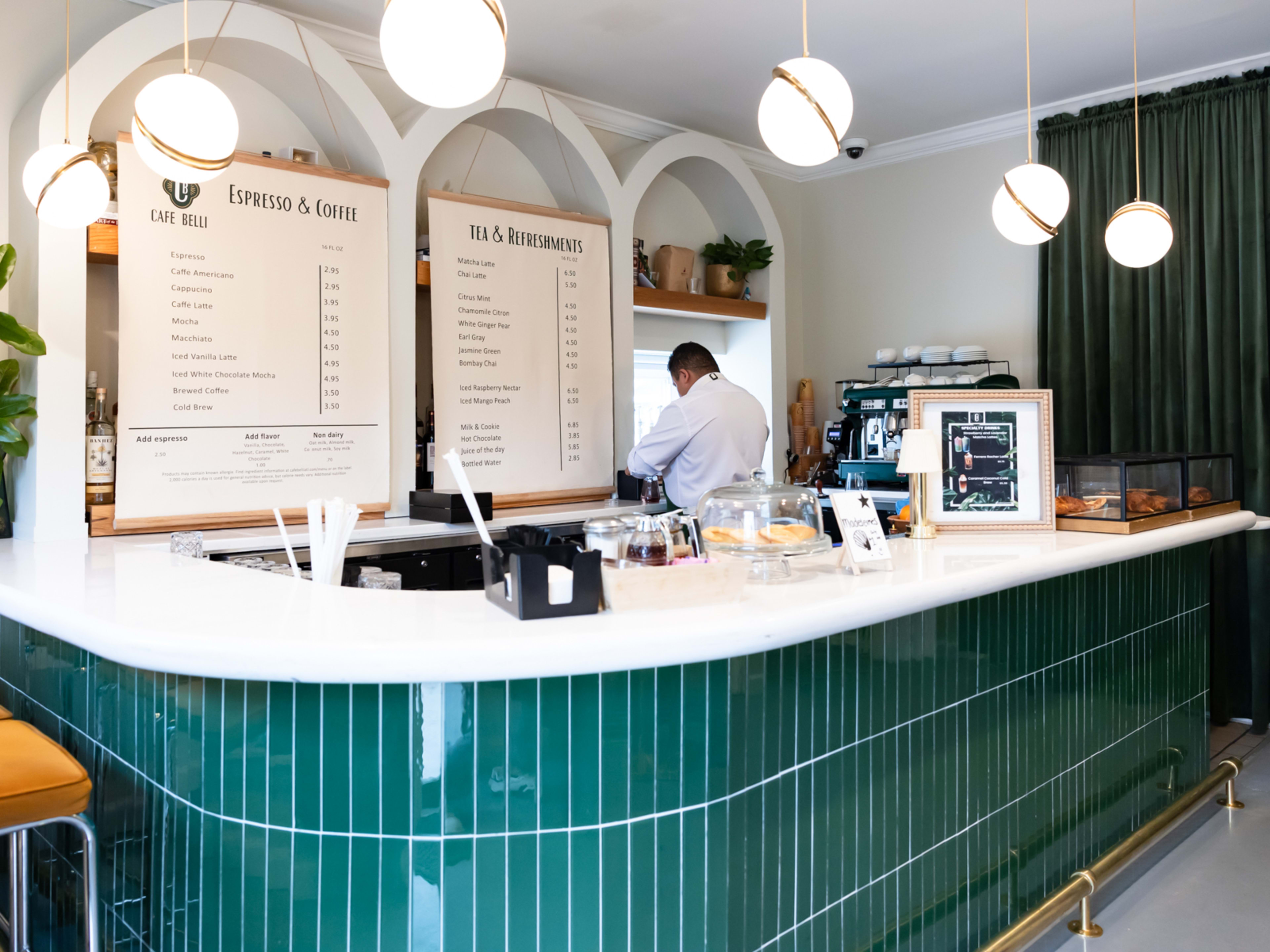 bar counter with green subway tile