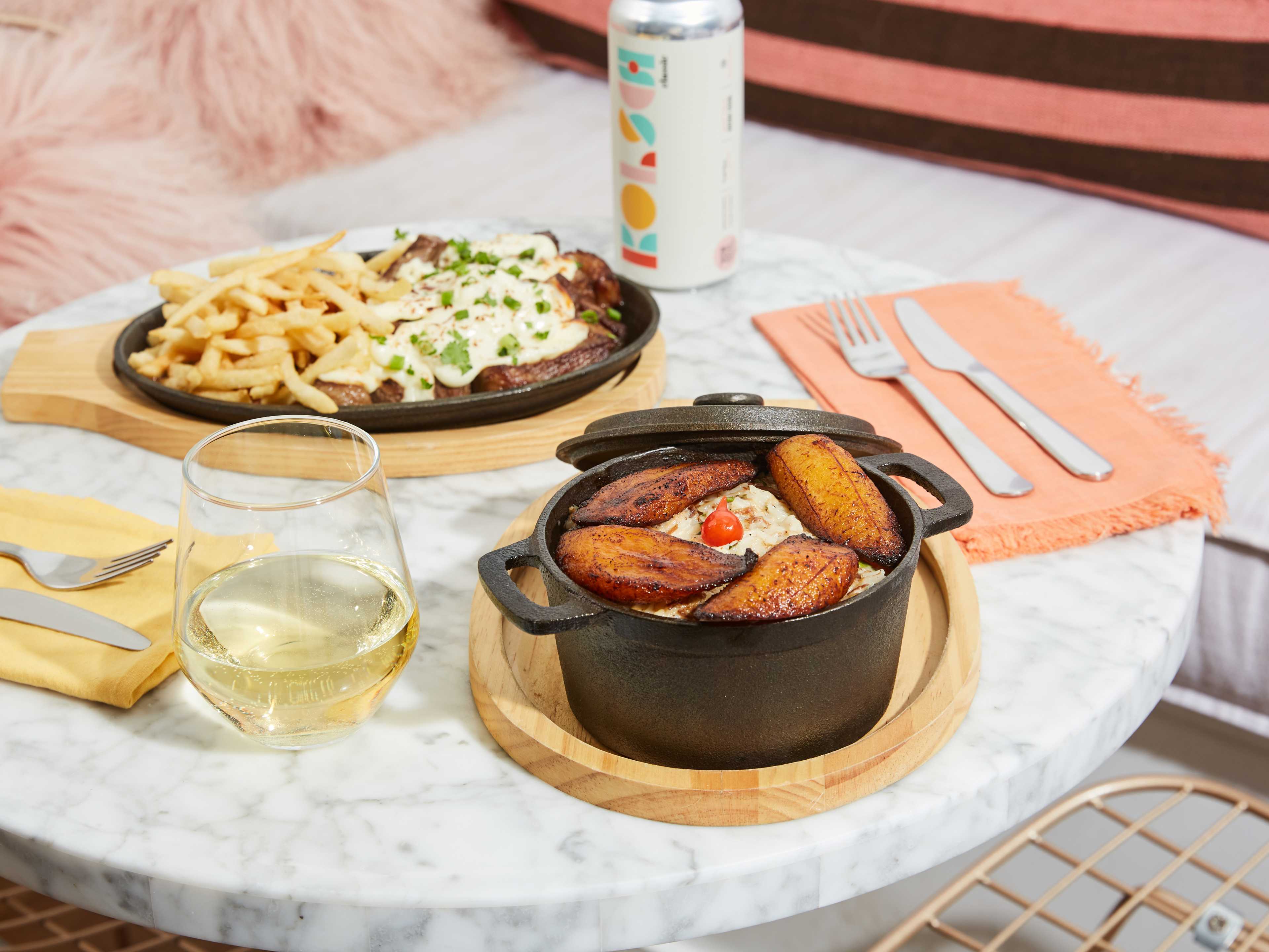 spread of brazilian dishes and wine