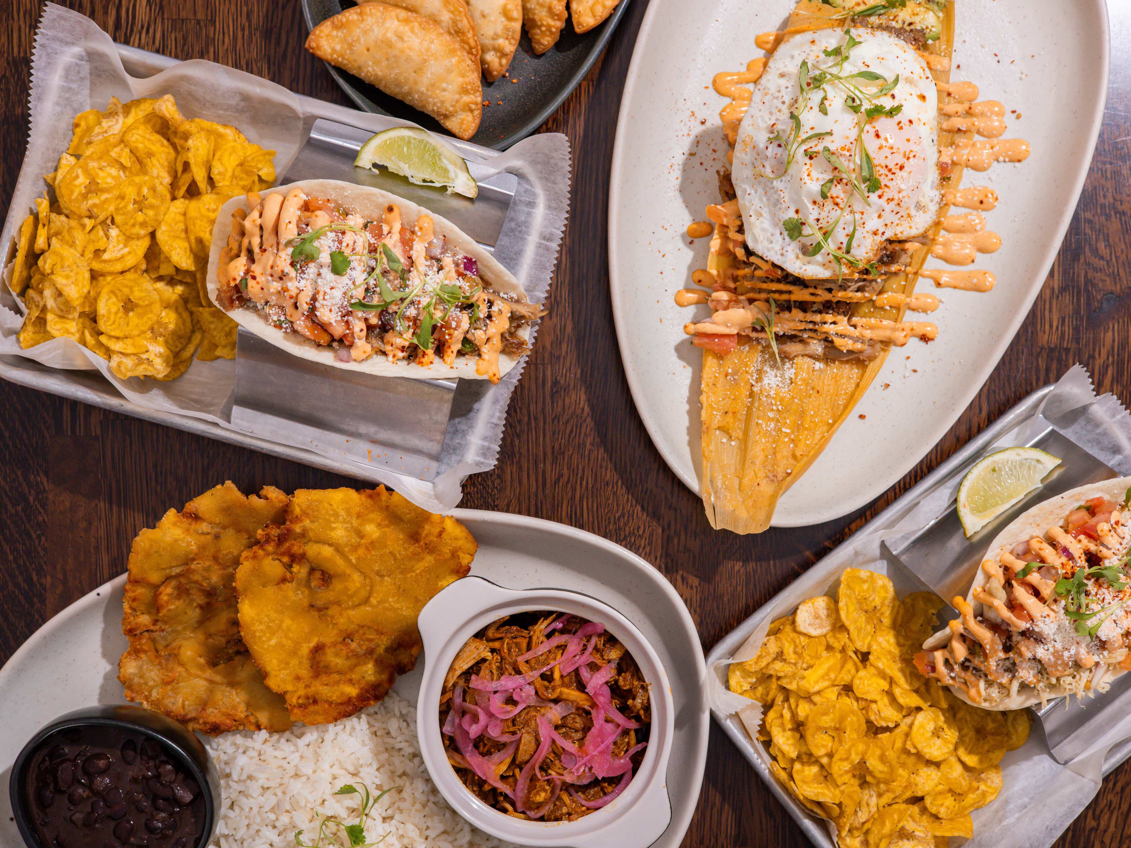 A food spread from Caja Caliente.