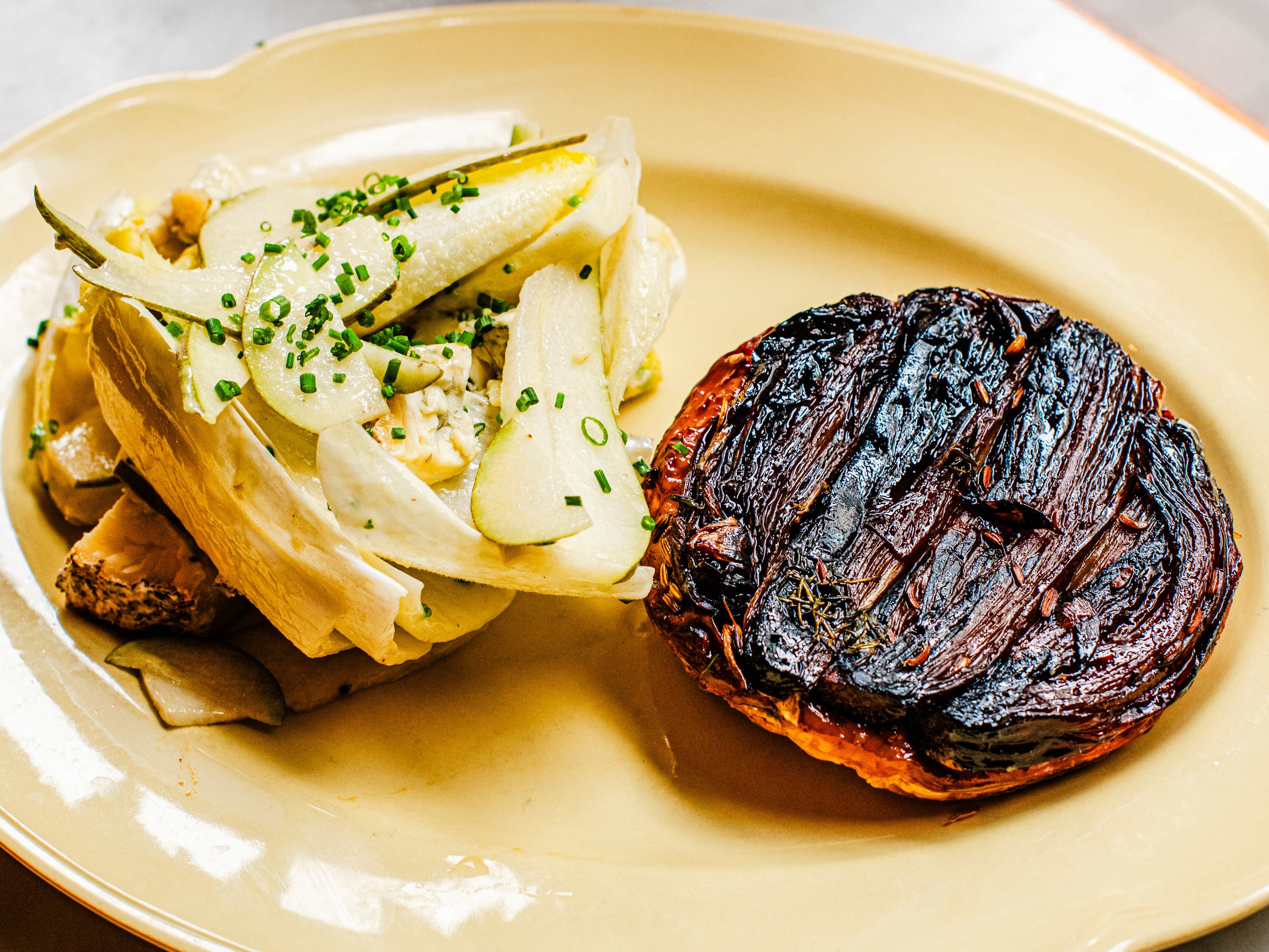 The shallot tatin with a fennel, apple, and blue cheese salad from Camille.