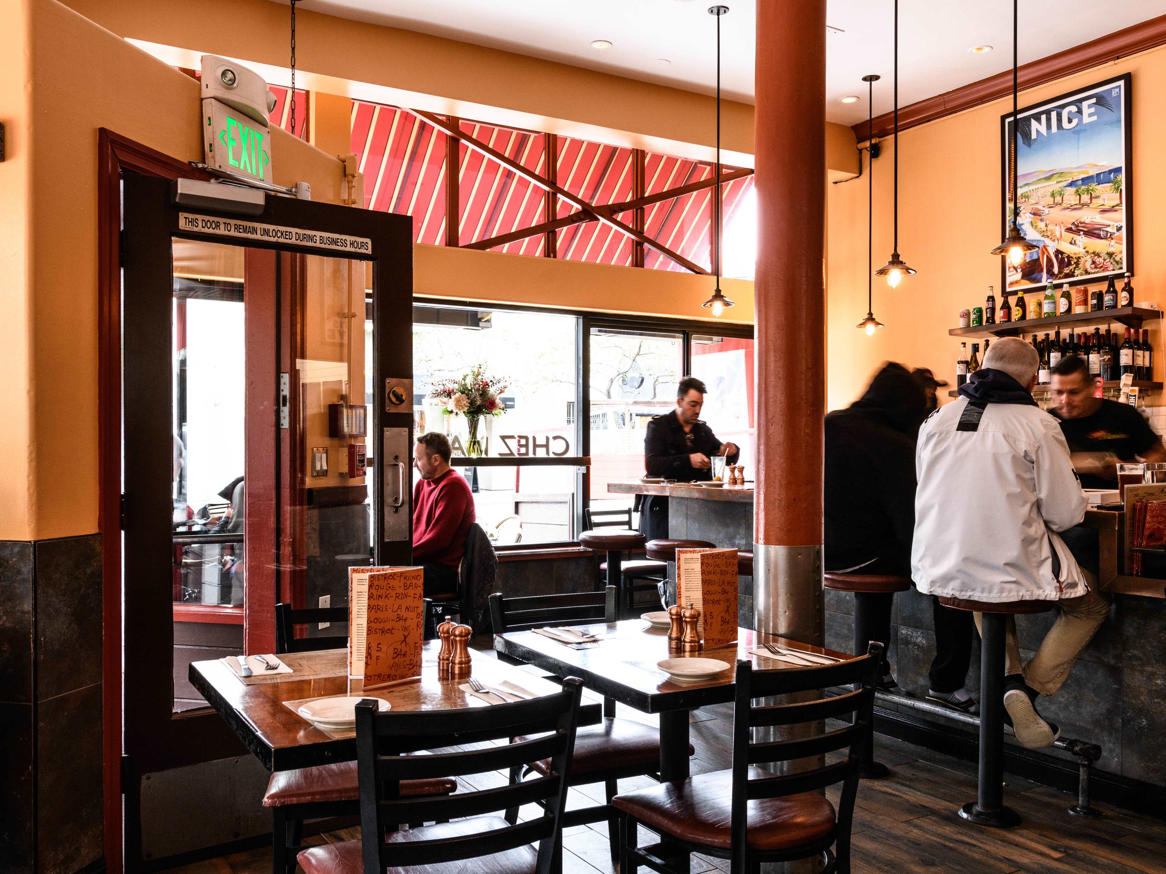 The dining room and bar at Chez Maman West