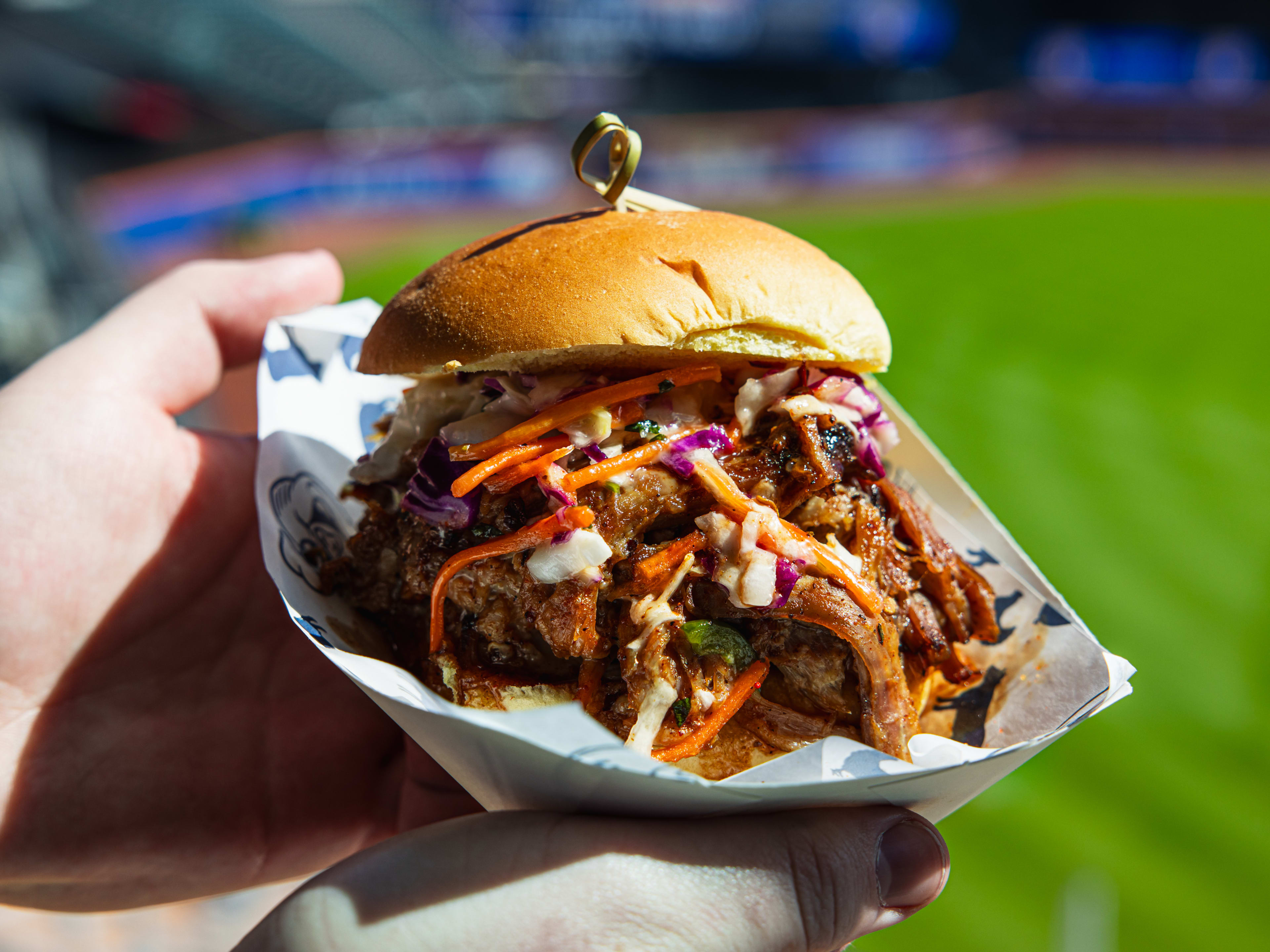 a pulled pork sandwich from pig beach at citi field