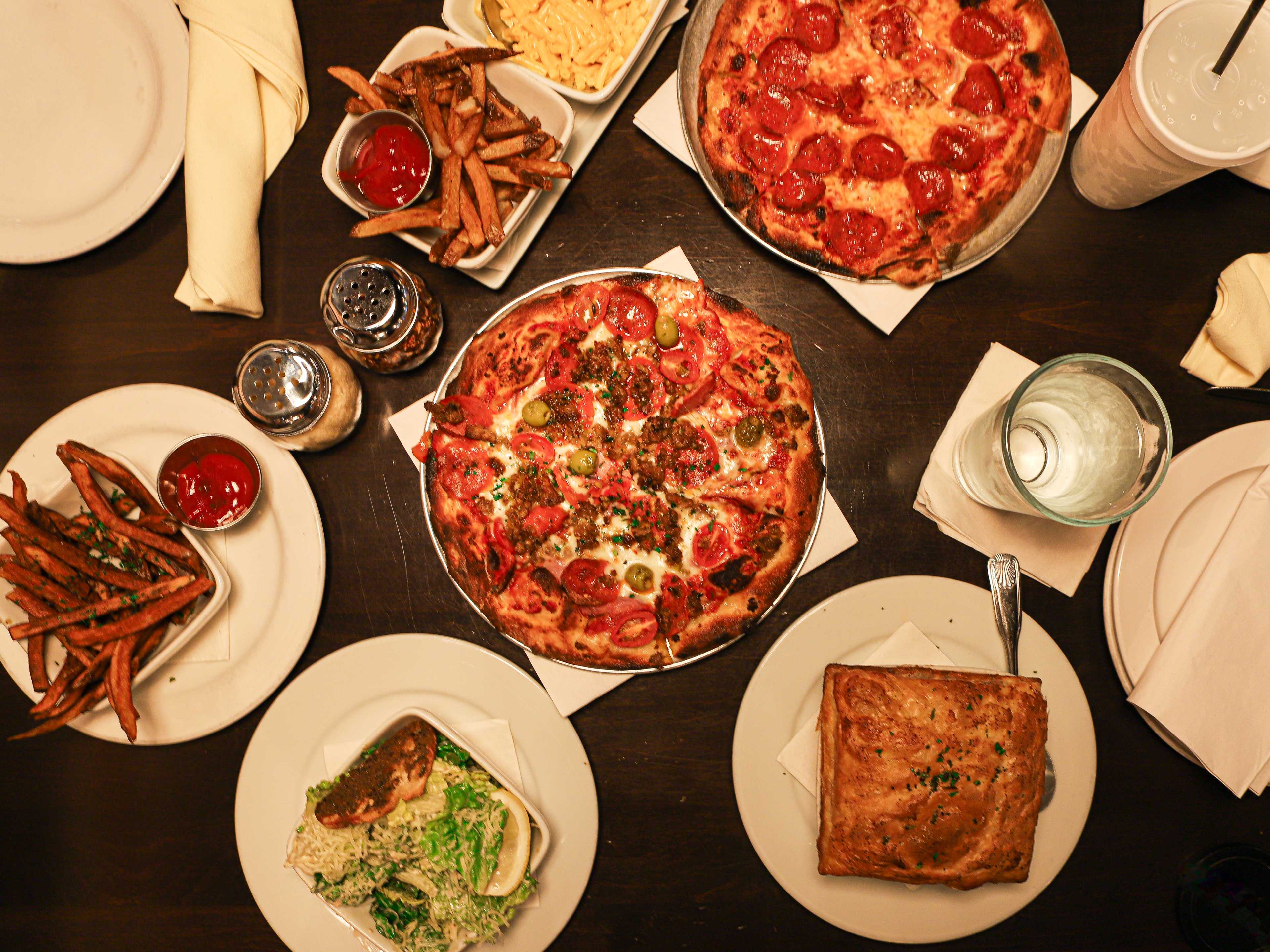 A spread of dishes on a table at Crisp.