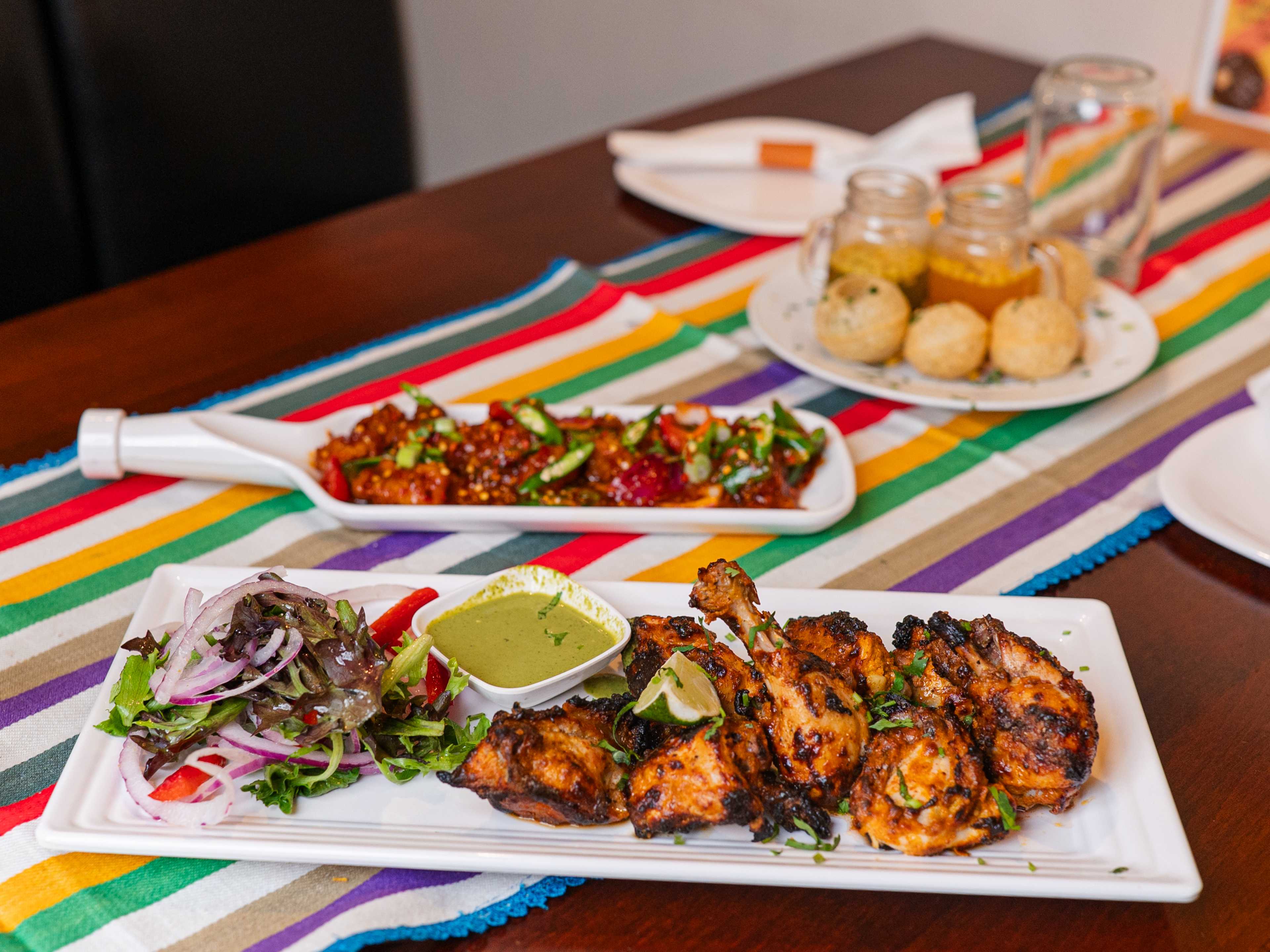 A spread of food from Curry & Tikka.