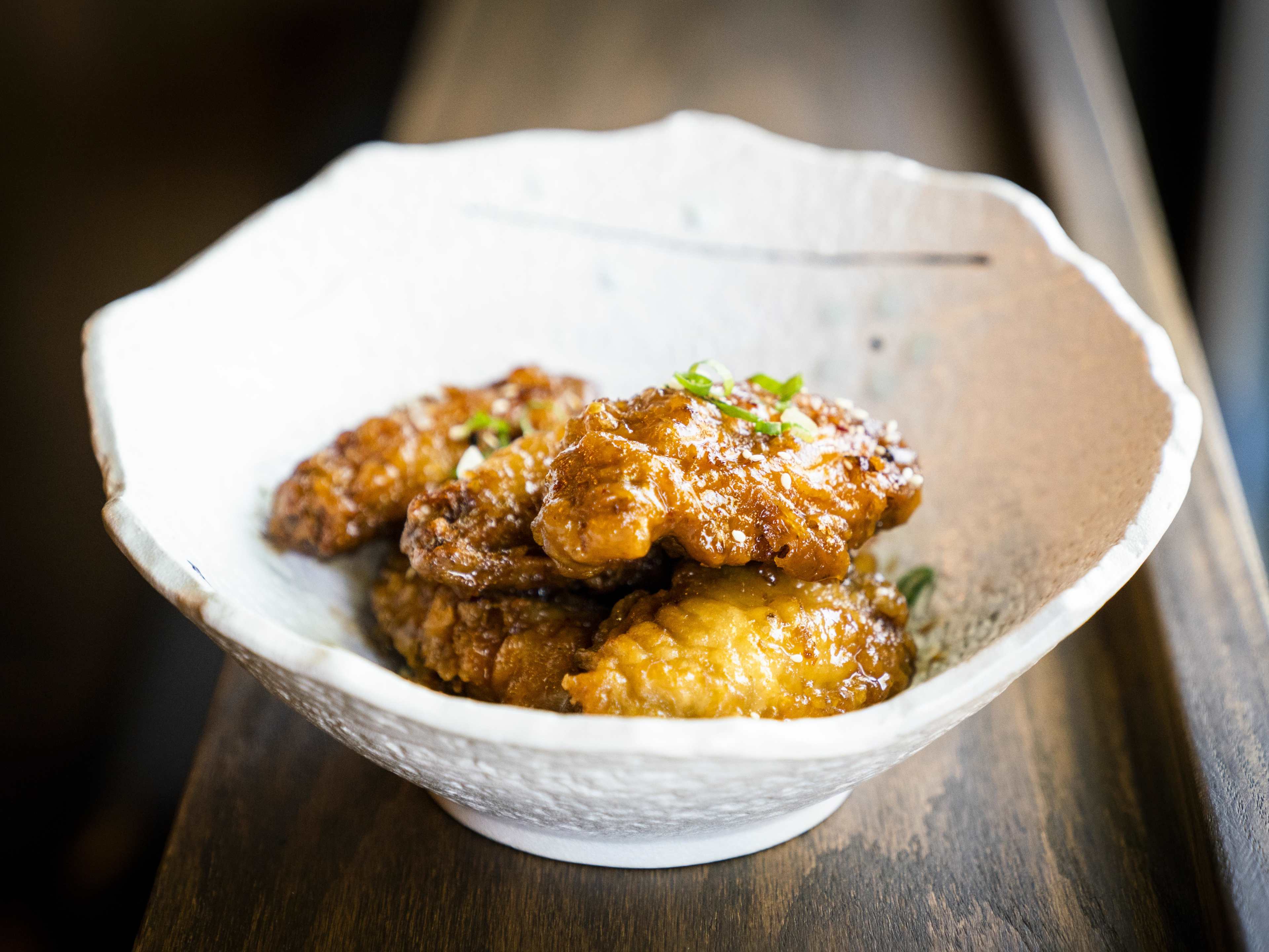 A bowl of dry-fried chicken wings at Dumpling Story