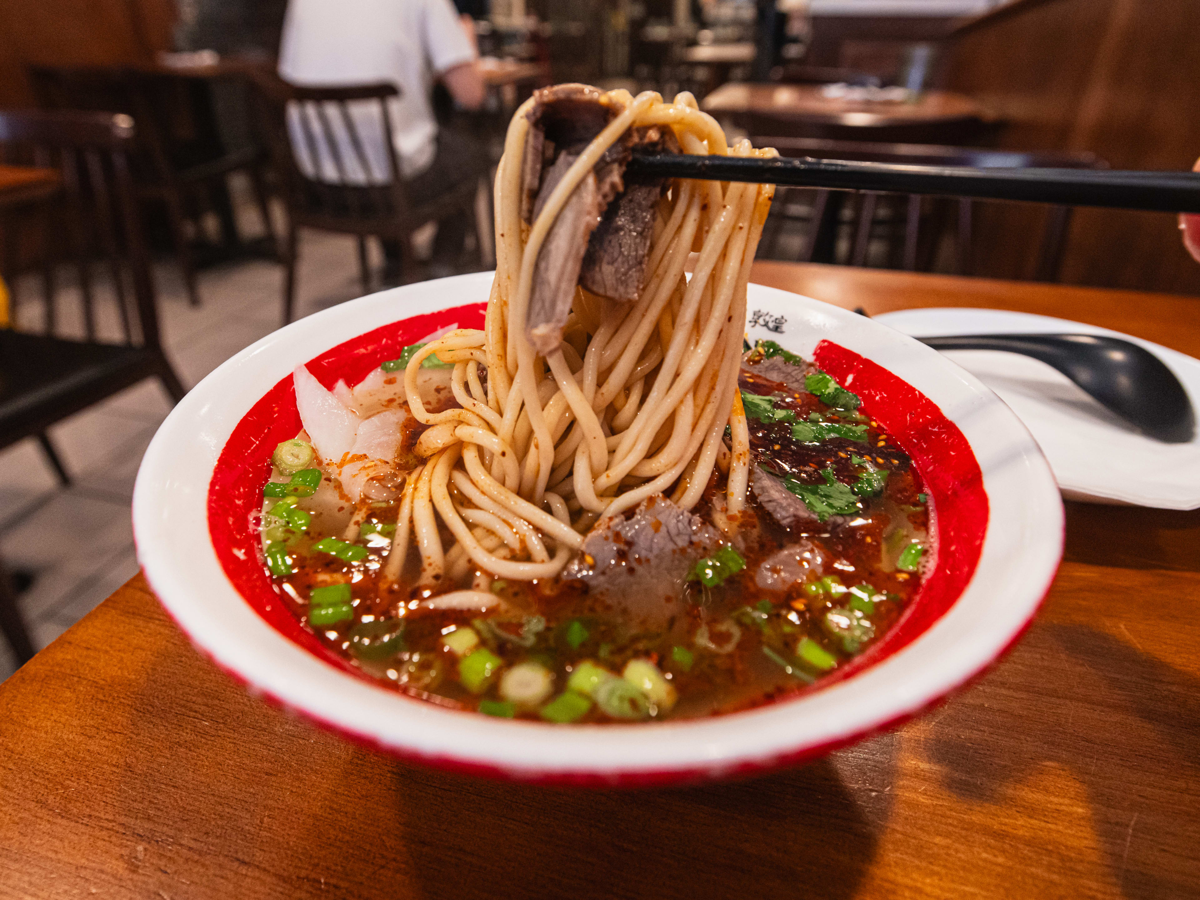 A bowl of beef noodle soup.