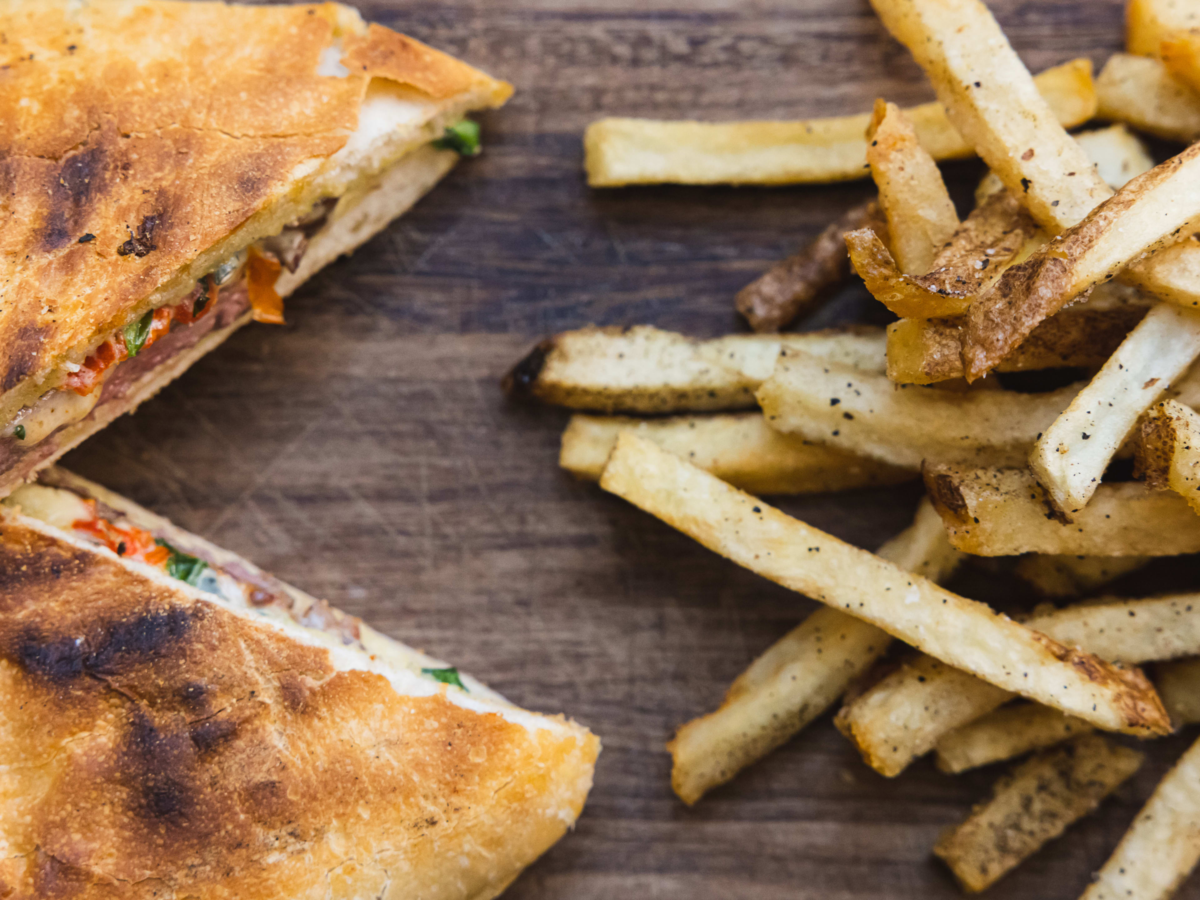 steak sandwich panini with fries