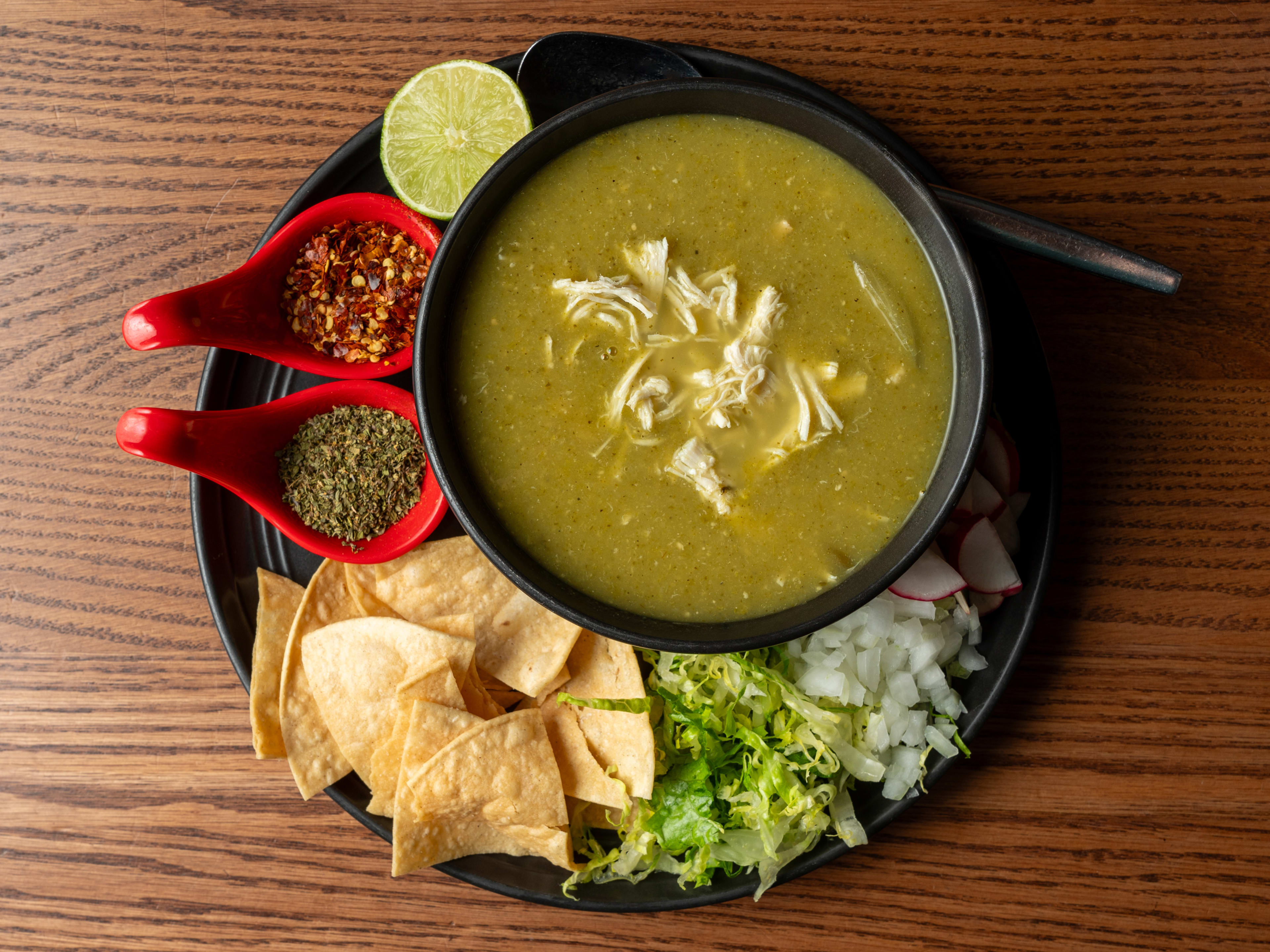 A bowl of pozole from El Buen Comer