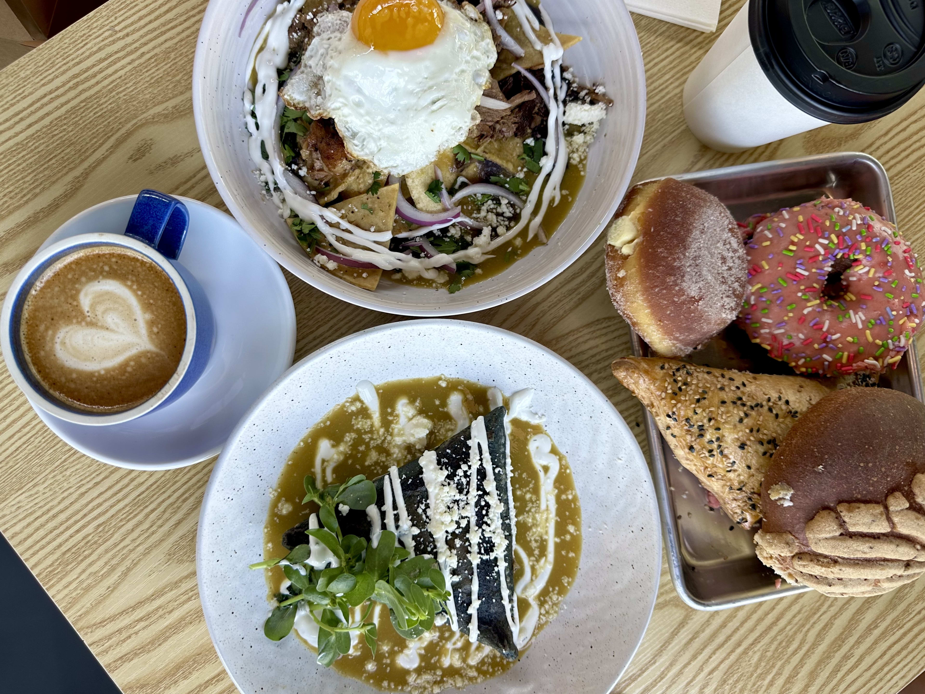 photo depicts coffee breakfast items, and conchas