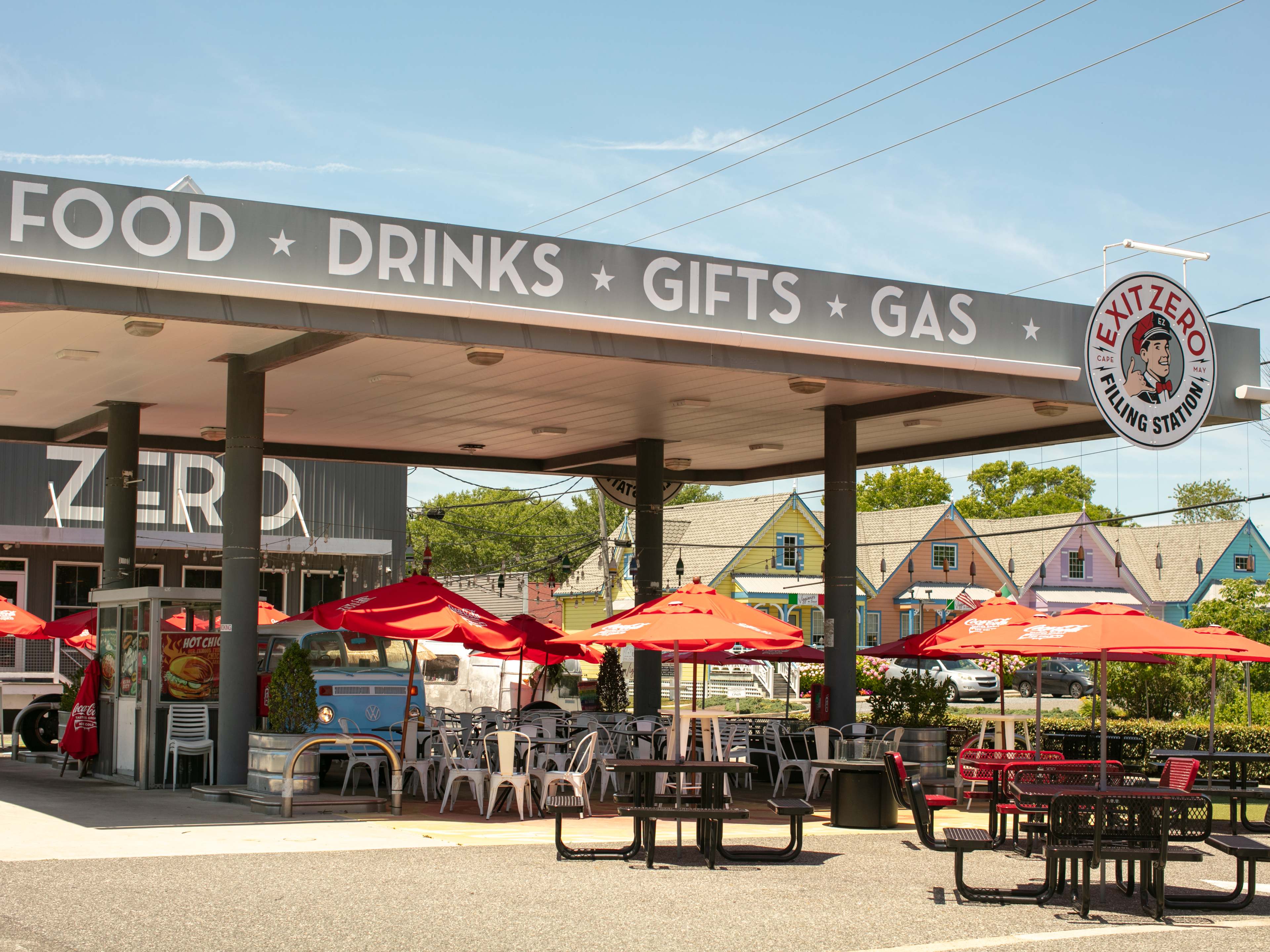 The exterior of Exit Zero with picnic tables outside