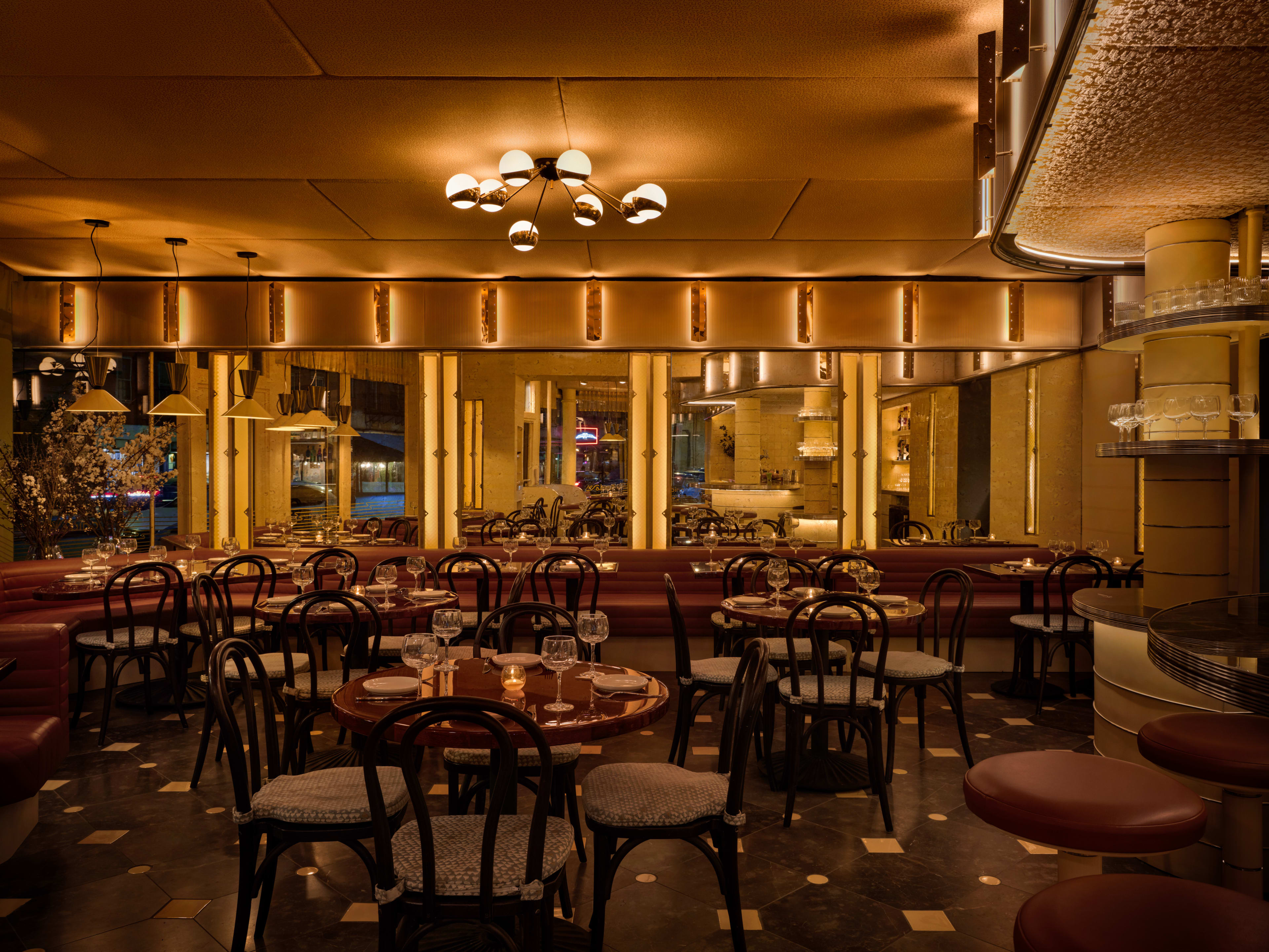 A dark and very yellow dining room in the West Village.